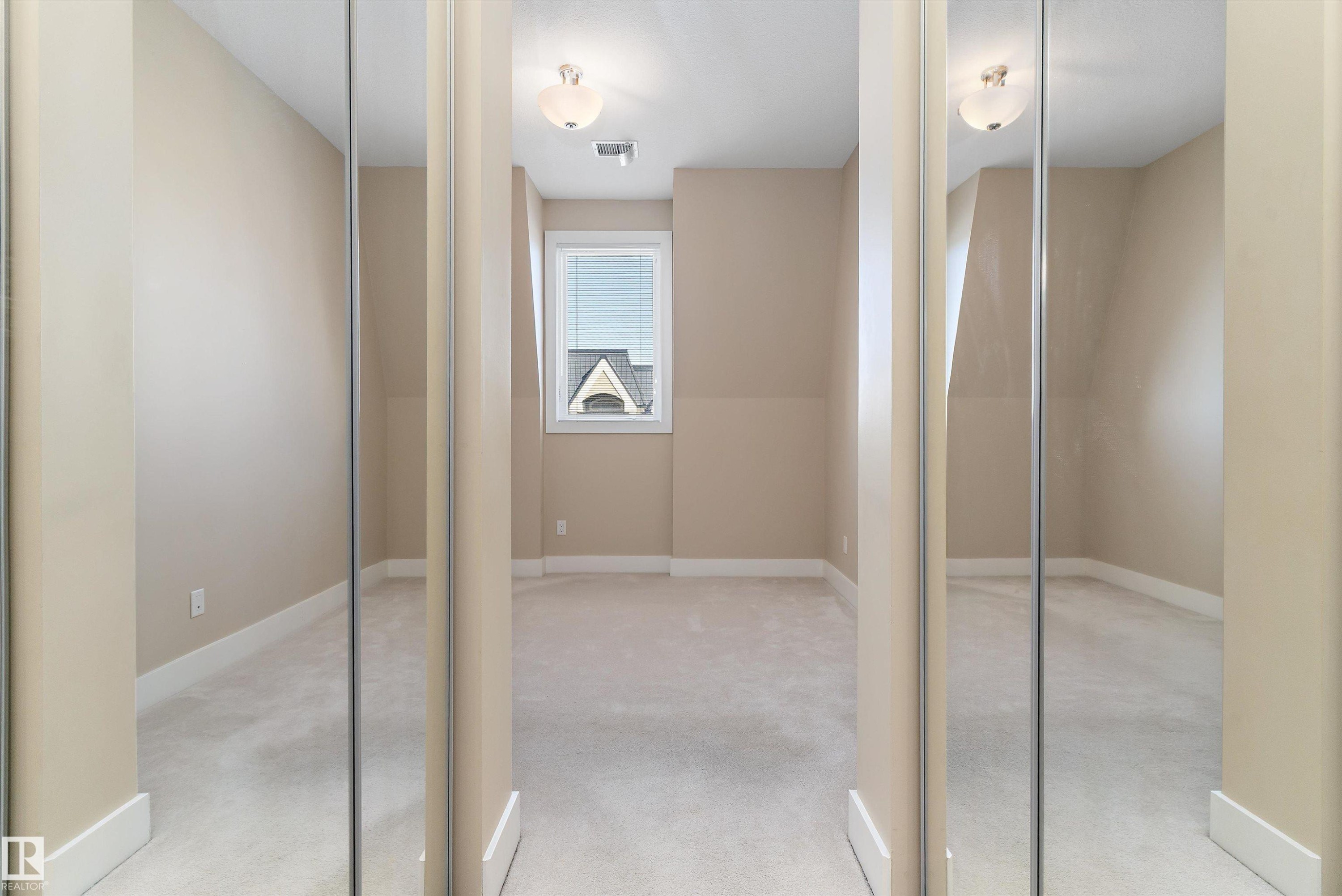 #449 6079 Maynard Wy Nw, Edmonton, AB - Indoor Photo Showing Other Room
