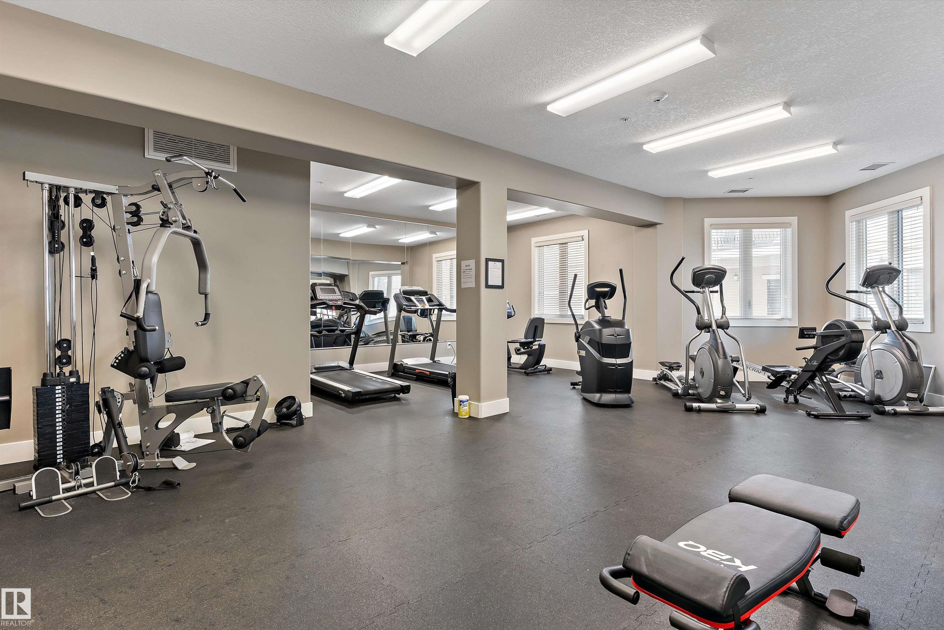 #449 6079 Maynard Wy Nw, Edmonton, AB - Indoor Photo Showing Gym Room
