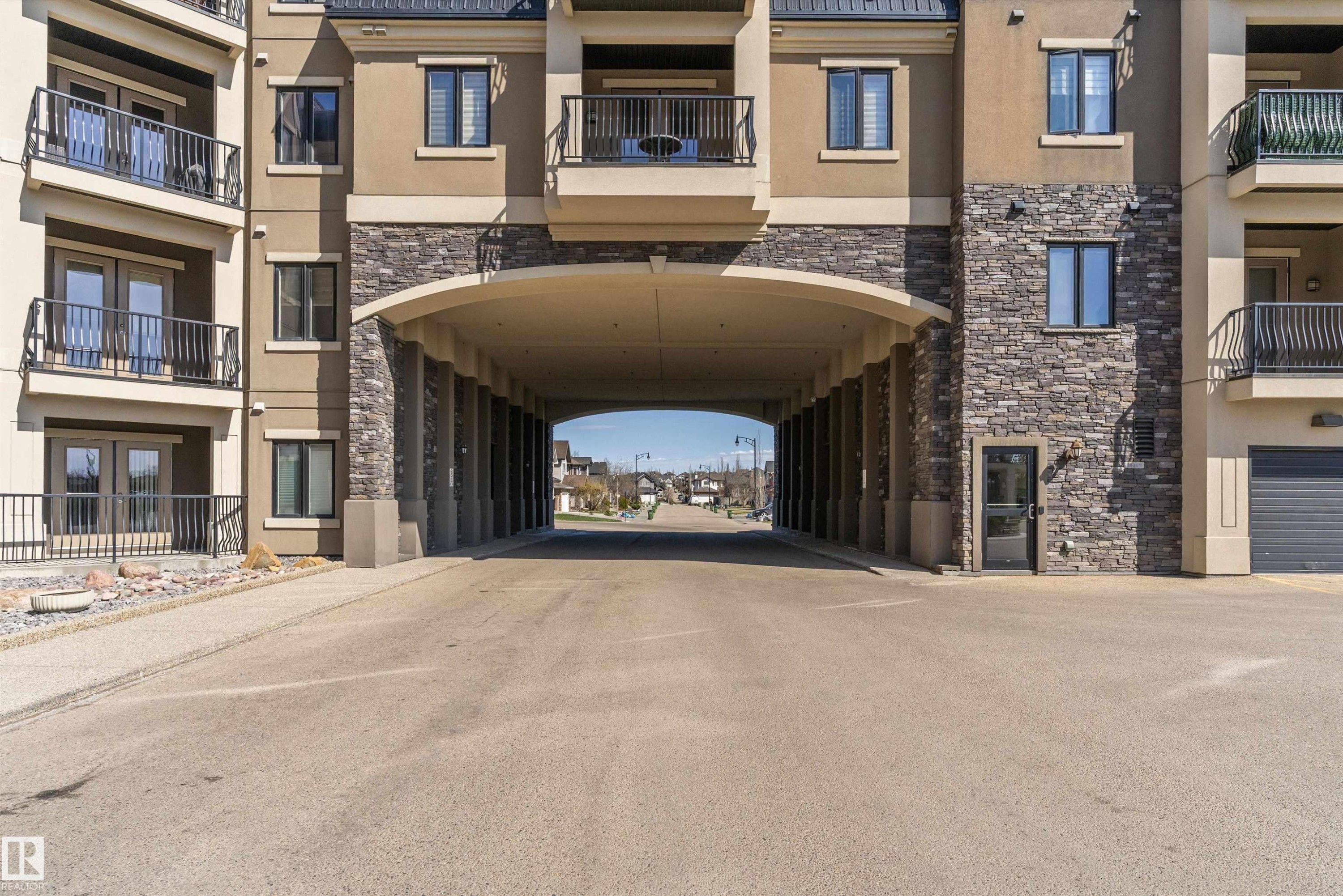 #449 6079 Maynard Wy Nw, Edmonton, AB - Outdoor With Balcony With Facade