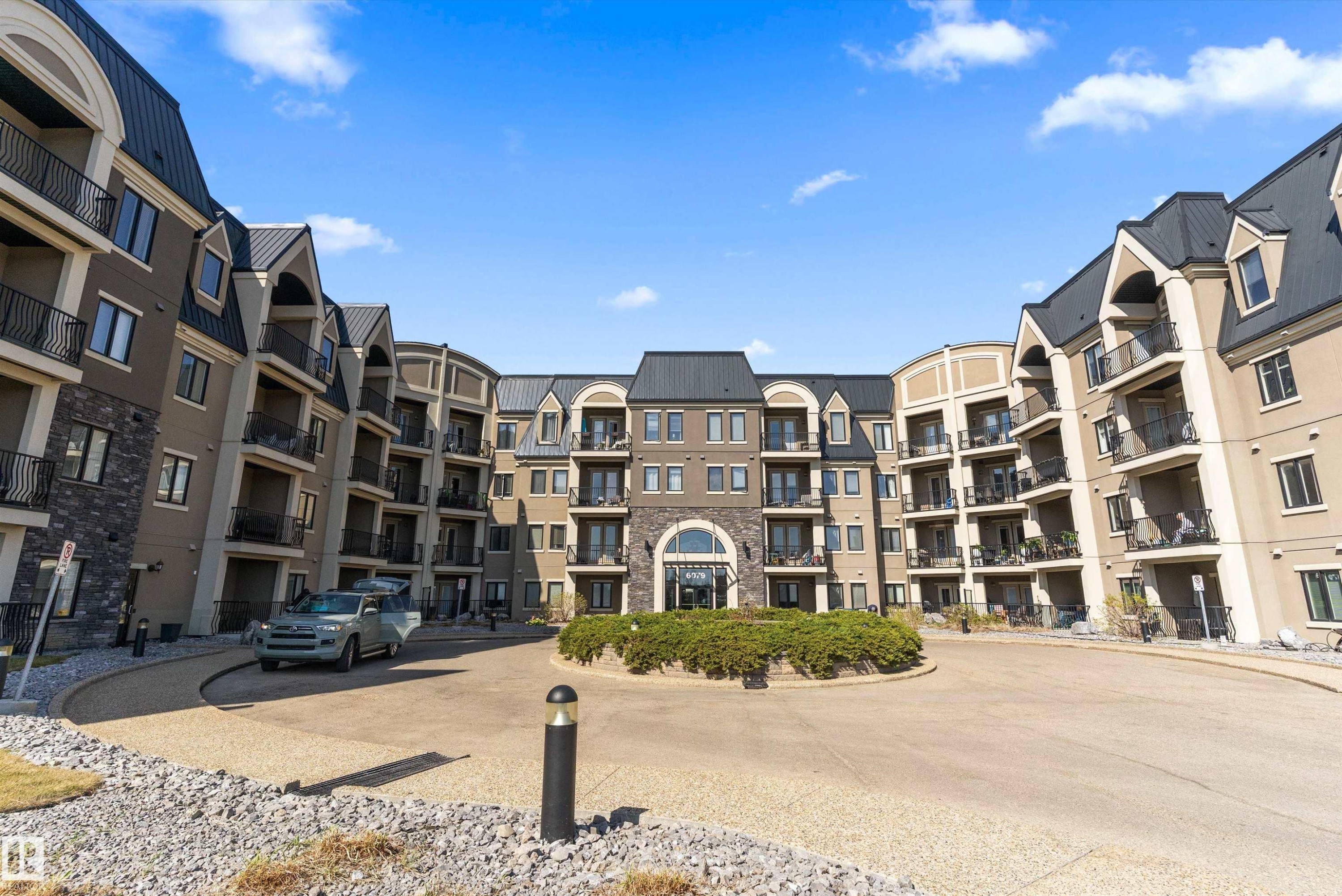 #449 6079 Maynard Wy Nw, Edmonton, AB - Outdoor With Balcony With Facade