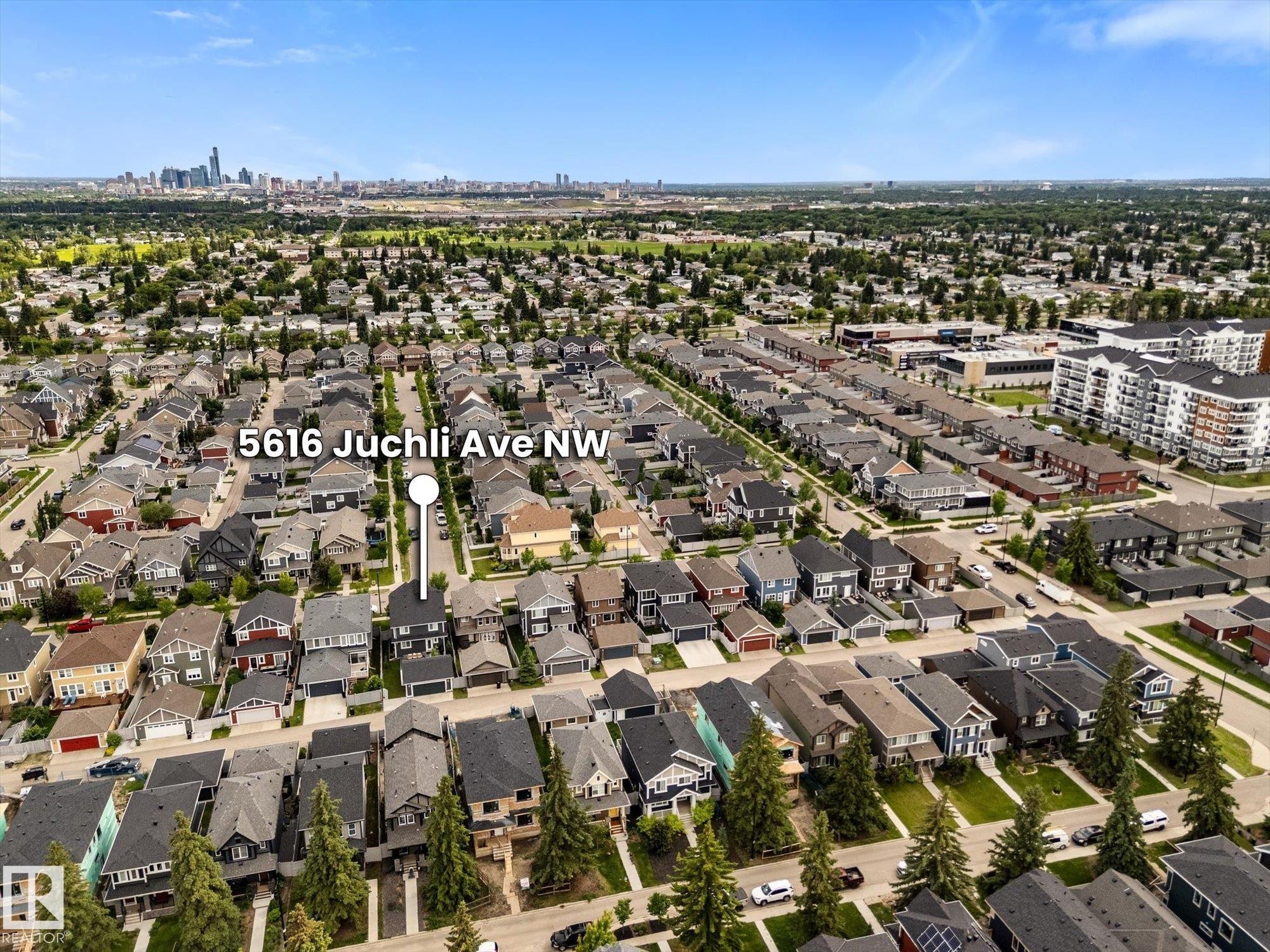 Residential neighborhood with varied architectural styles and mature trees - 5616 Juchli Avenue Nw, Edmonton, AB - Outdoor With View