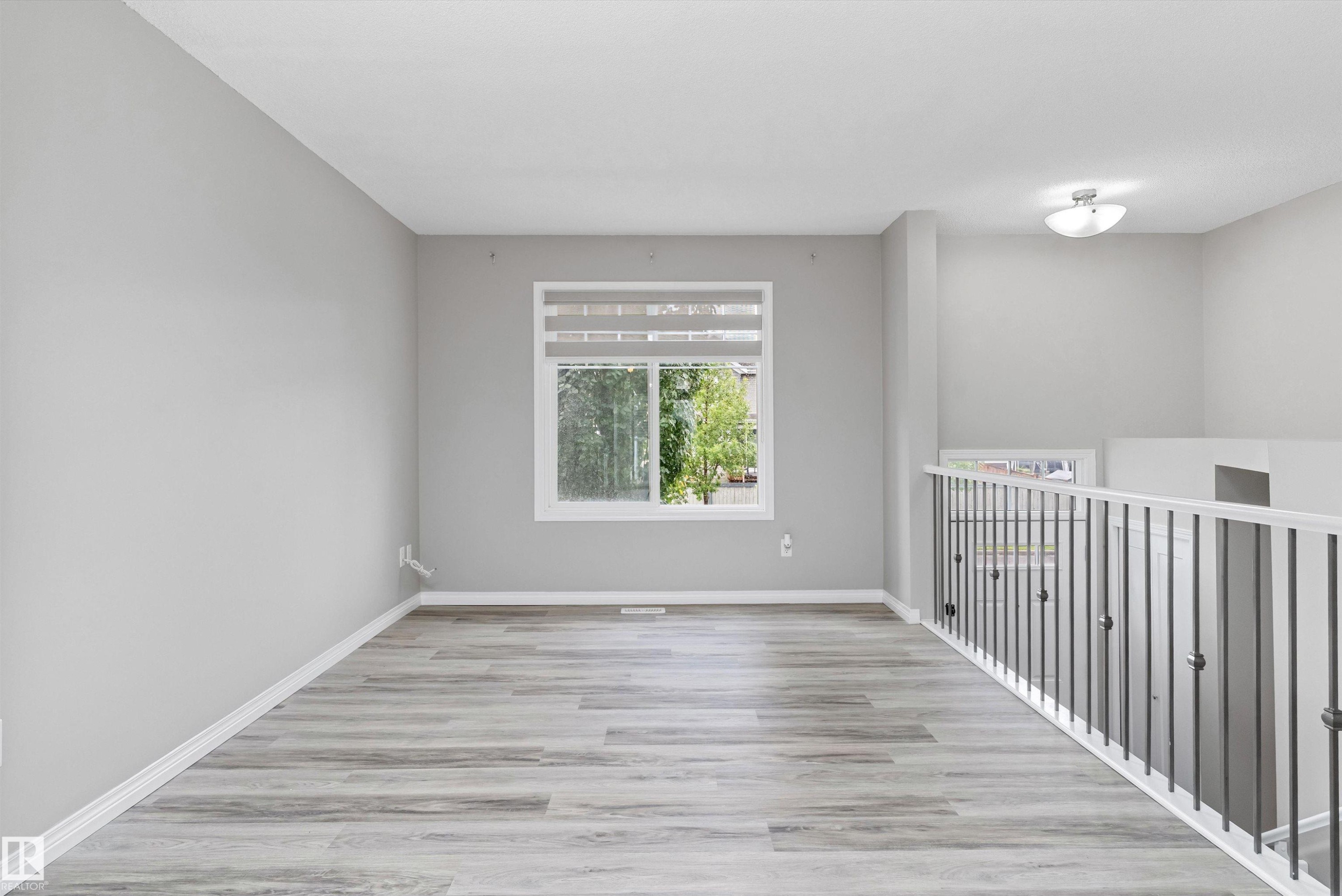 #98 4050 Savaryn Dr Sw, Edmonton, AB - Indoor Photo Showing Other Room