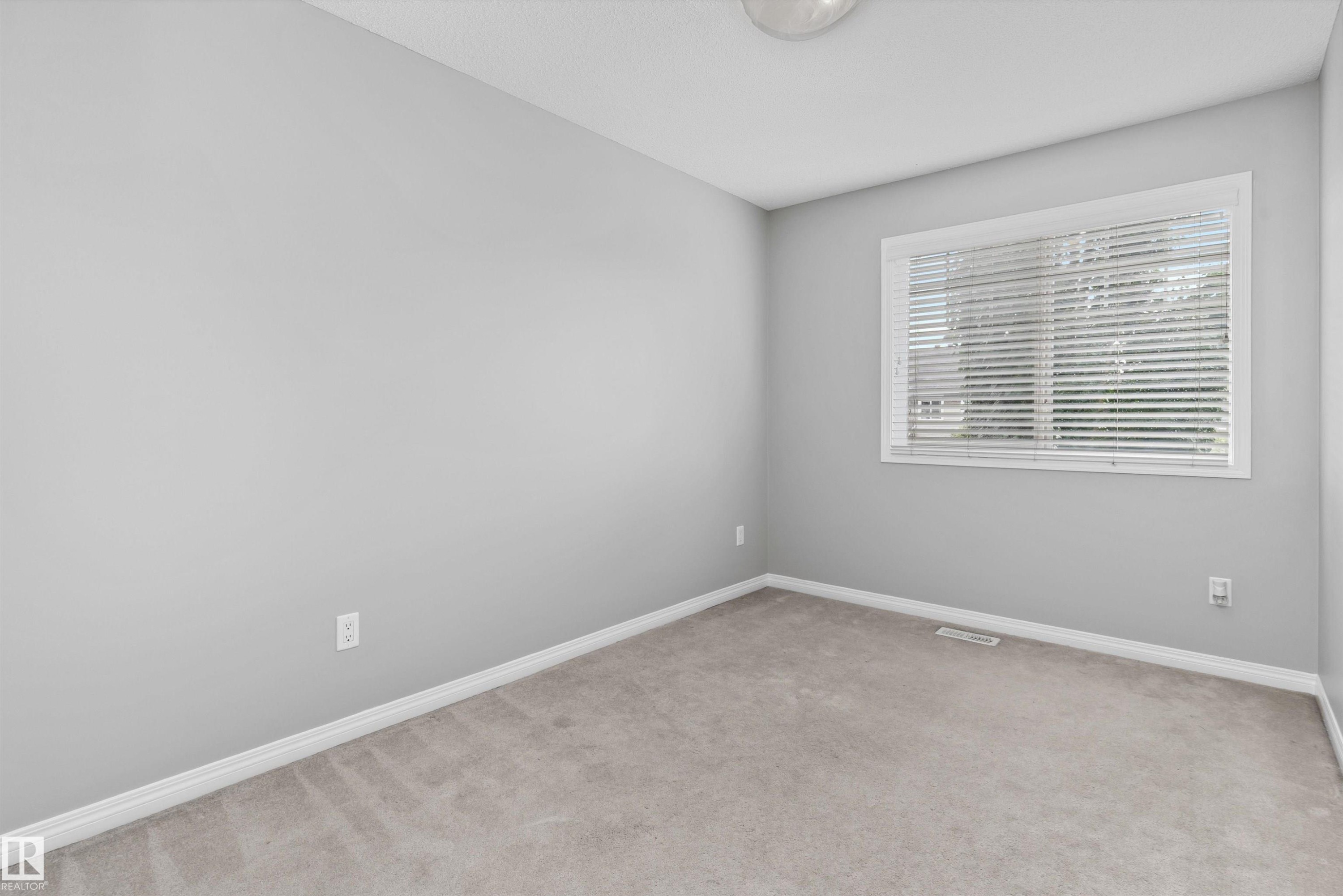 #98 4050 Savaryn Dr Sw, Edmonton, AB - Indoor Photo Showing Other Room