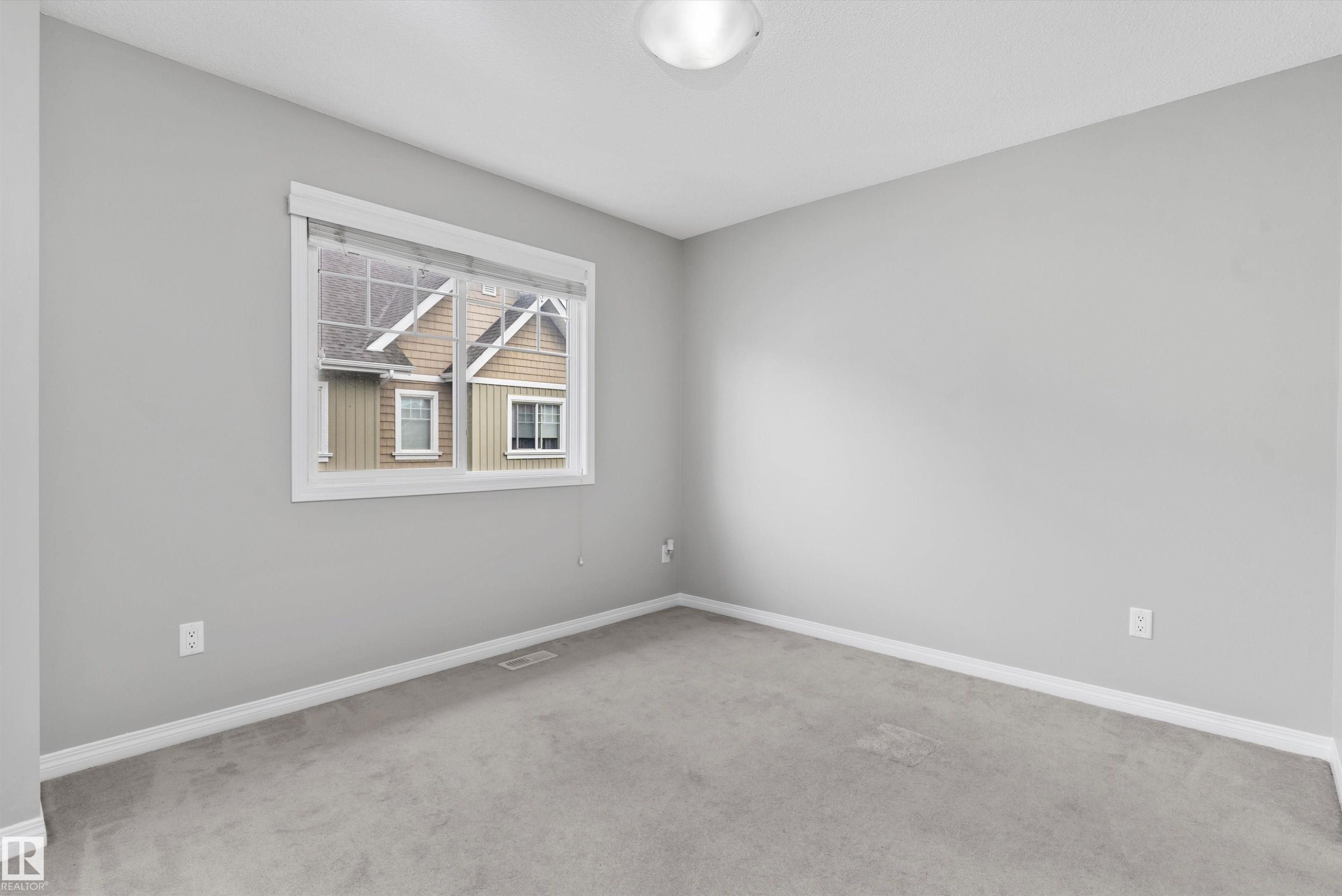 #98 4050 Savaryn Dr Sw, Edmonton, AB - Indoor Photo Showing Other Room