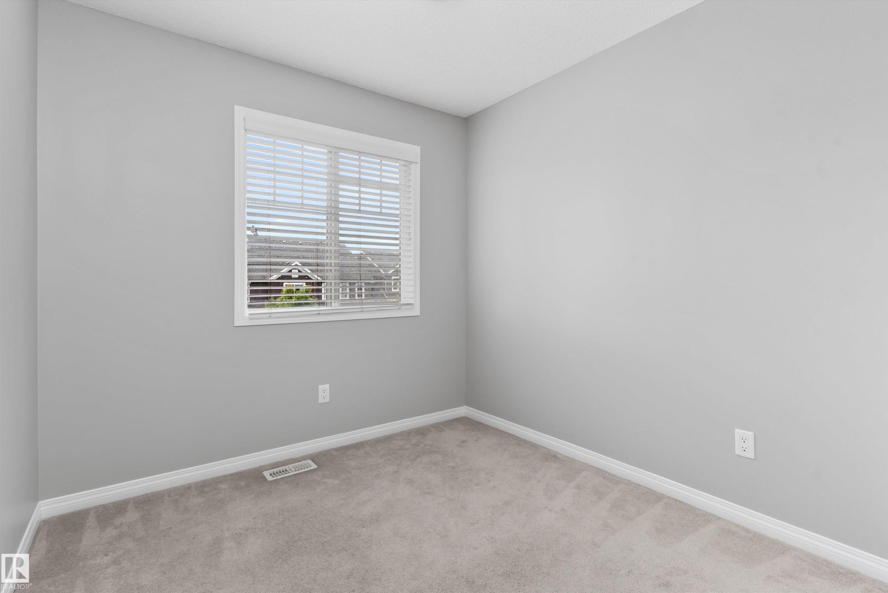 #98 4050 Savaryn Dr Sw, Edmonton, AB - Indoor Photo Showing Other Room