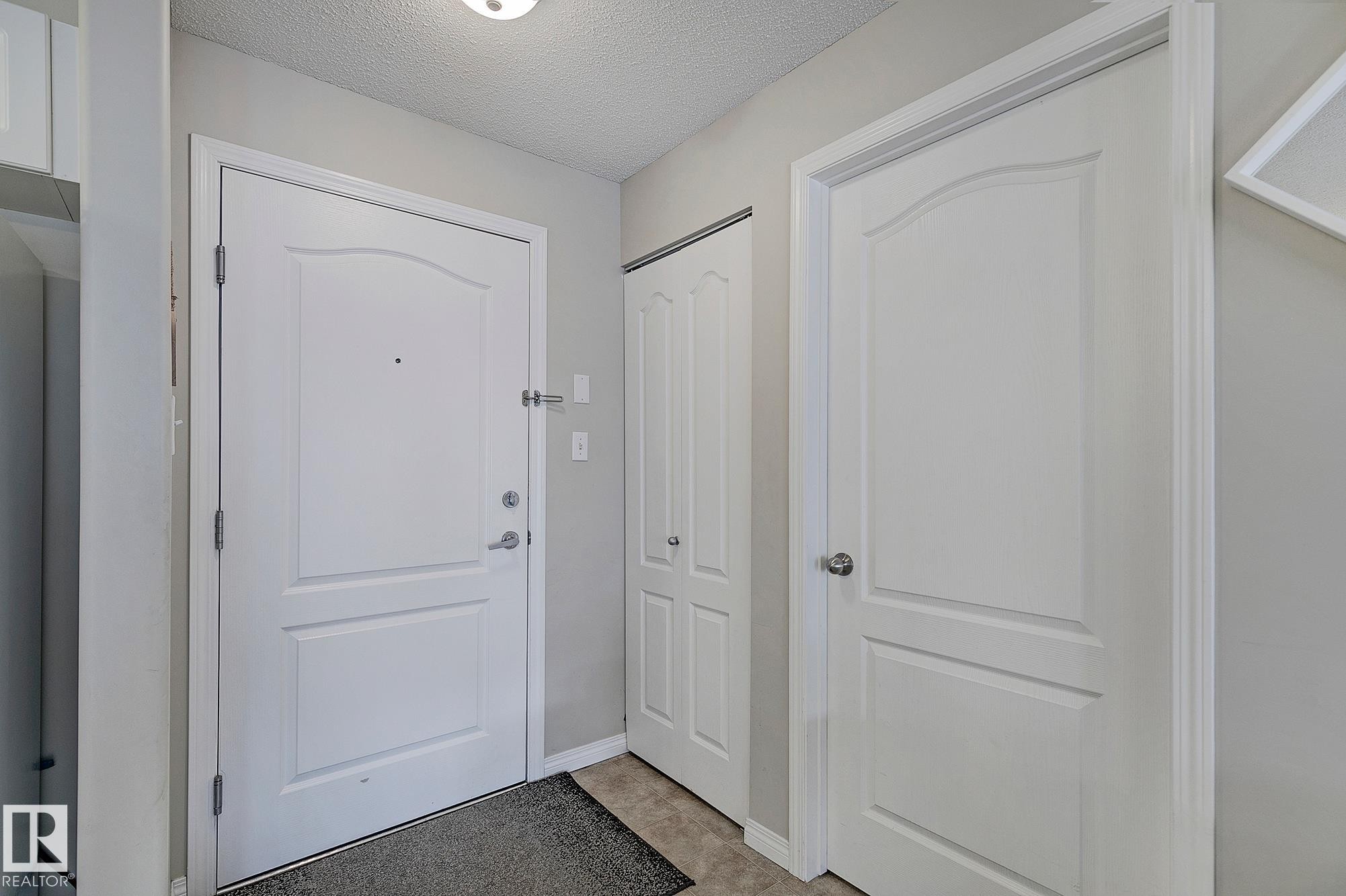 #203 111 Edwards Dr Sw, Edmonton, AB - Indoor Photo Showing Other Room