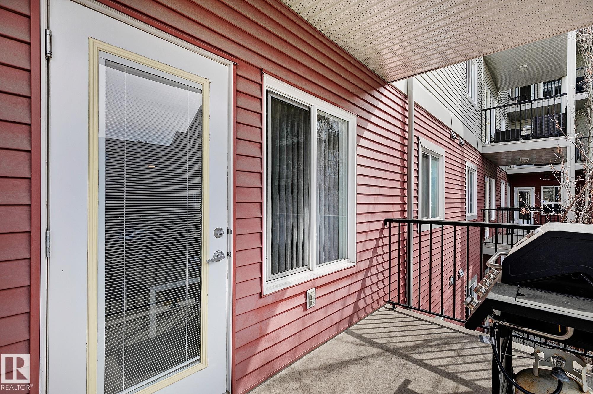 #203 111 Edwards Dr Sw, Edmonton, AB - Outdoor With Balcony With Exterior