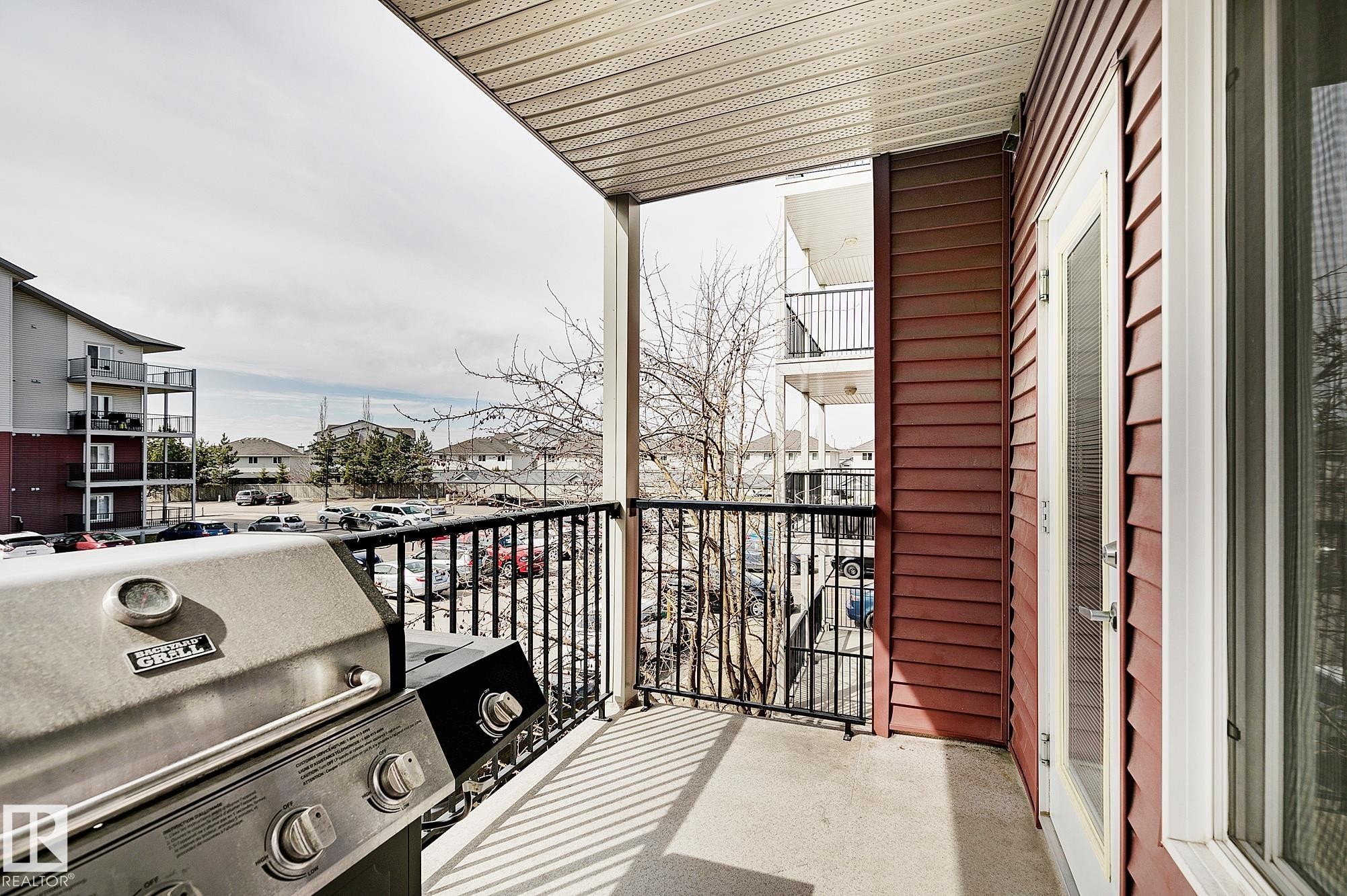 #203 111 Edwards Dr Sw, Edmonton, AB - Outdoor With Balcony With Exterior