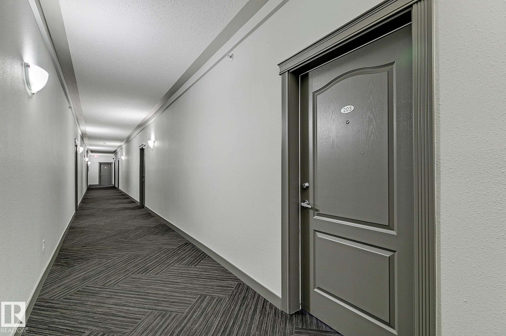 #203 111 Edwards Dr Sw, Edmonton, AB - Indoor Photo Showing Other Room