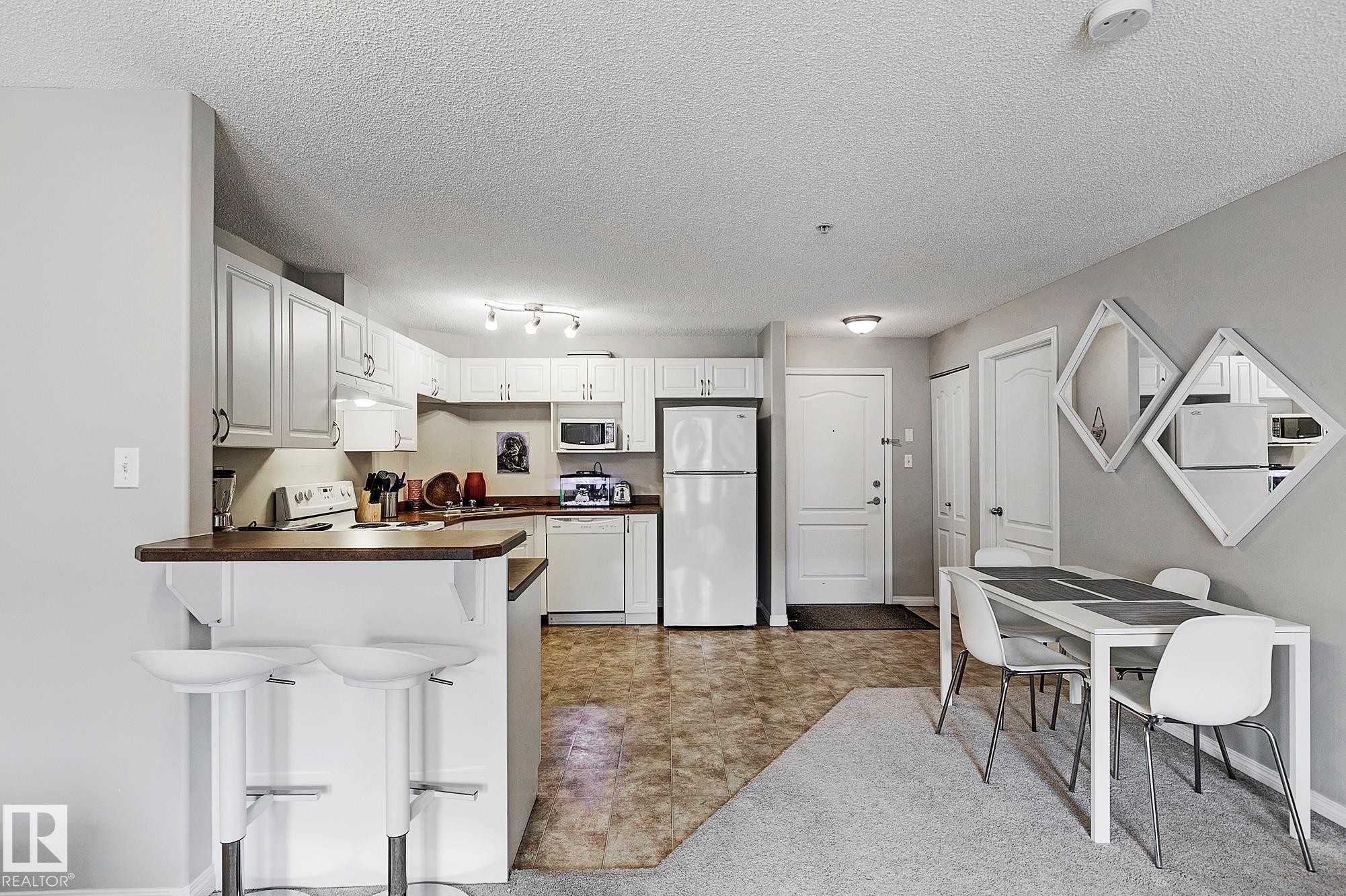 #203 111 Edwards Dr Sw, Edmonton, AB - Indoor Photo Showing Kitchen