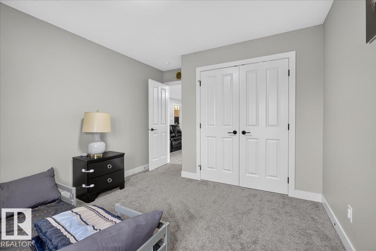 Wall-to-wall carpeting and neutral wall paint - 6813 Knox Loop Sw, Edmonton, AB - Indoor Photo Showing Bedroom