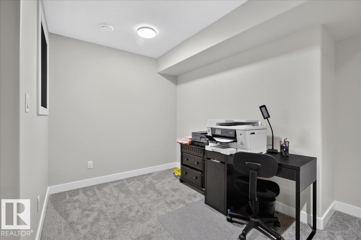 Recessed ceiling light, neutral wall color, white trim, and gray carpet - 6813 Knox Loop Sw, Edmonton, AB - Indoor Photo Showing Office