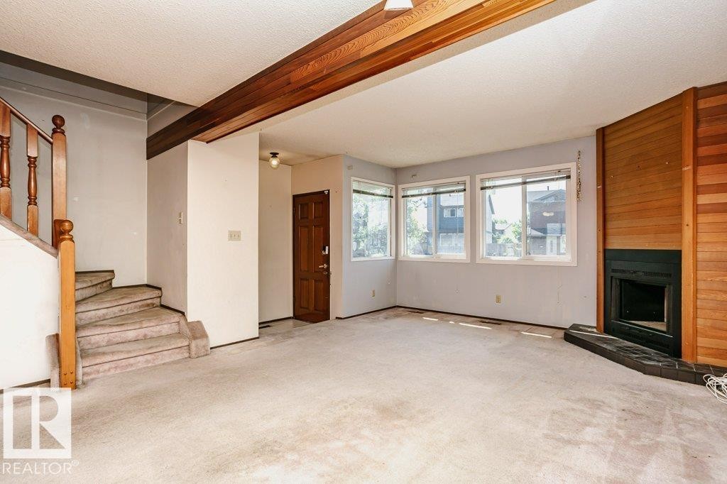 3520 42 Avenue Nw, Edmonton, AB - Indoor Photo Showing Other Room With Fireplace