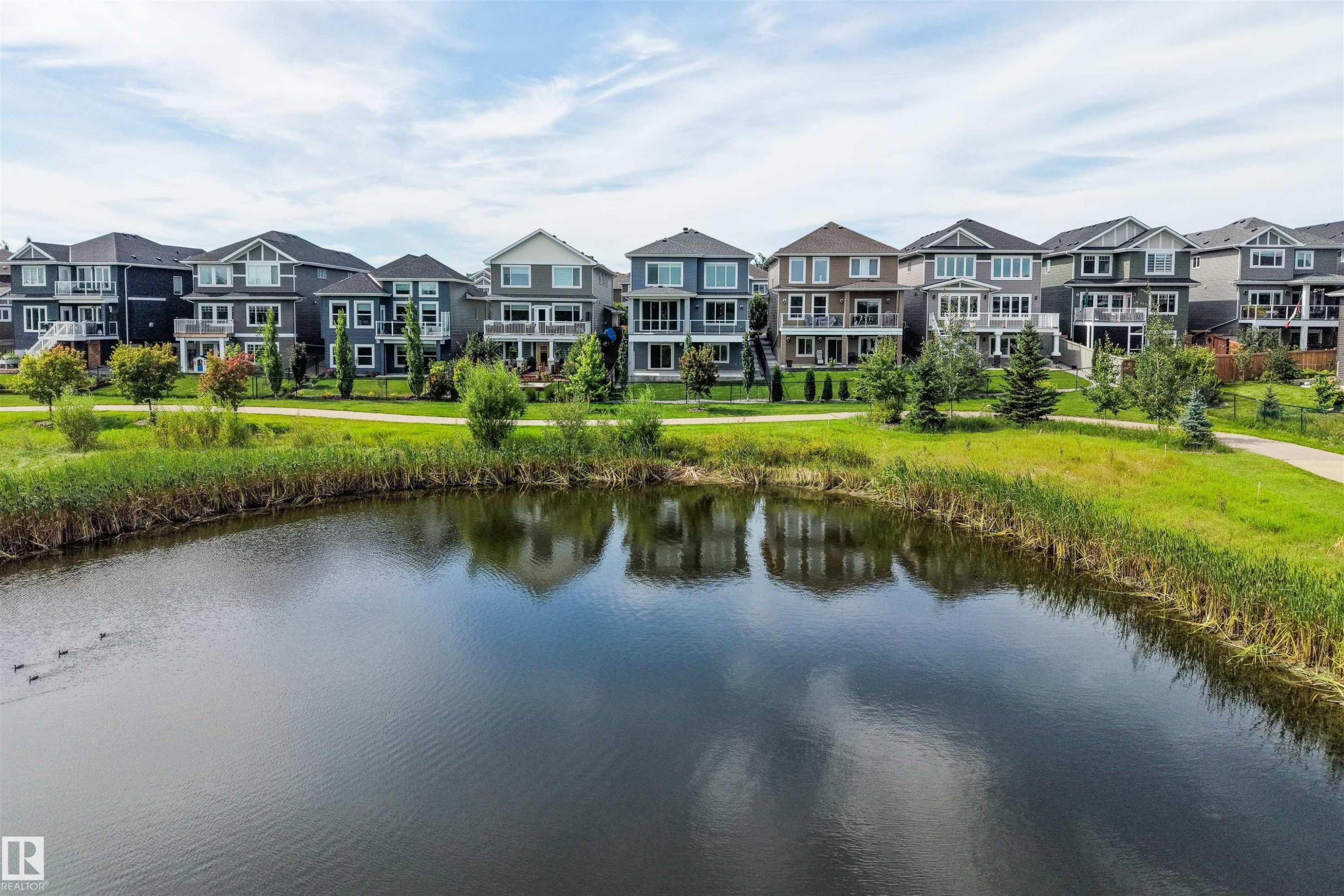 3415 Chickadee Drive Nw, Edmonton, AB - Outdoor With Body Of Water With Facade
