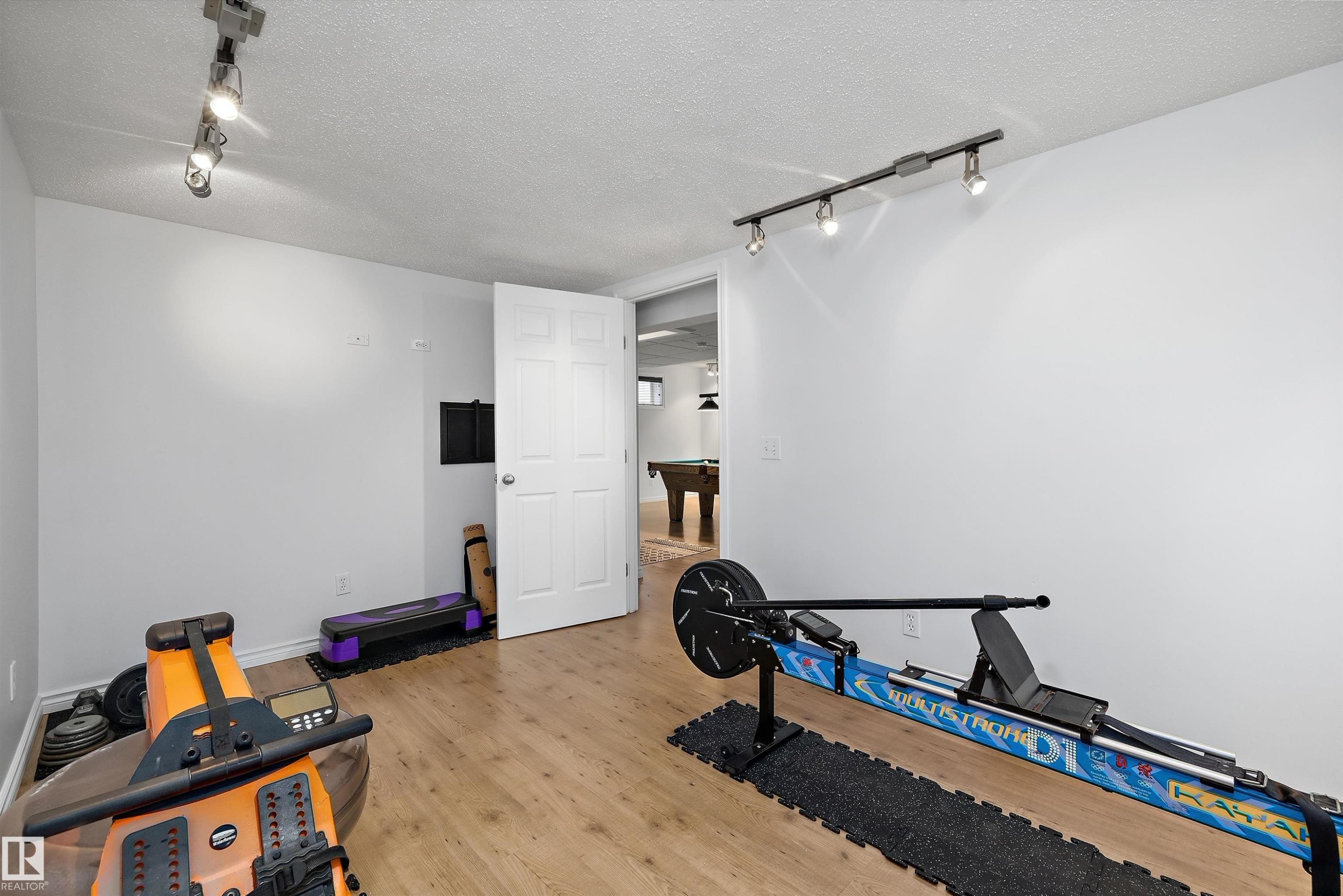 133 Greystone Crescent, Spruce Grove, AB - Indoor Photo Showing Gym Room