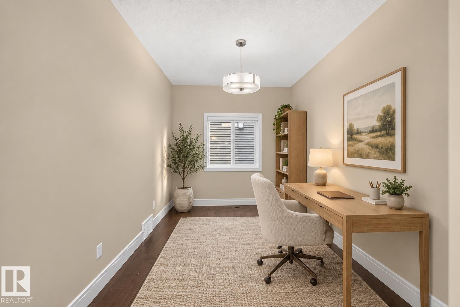 Hardwood-style flooring, neutral wall tones, white trim, recessed lighting, and a window with blinds - 7014 Chivers Loop Sw, Edmonton, AB