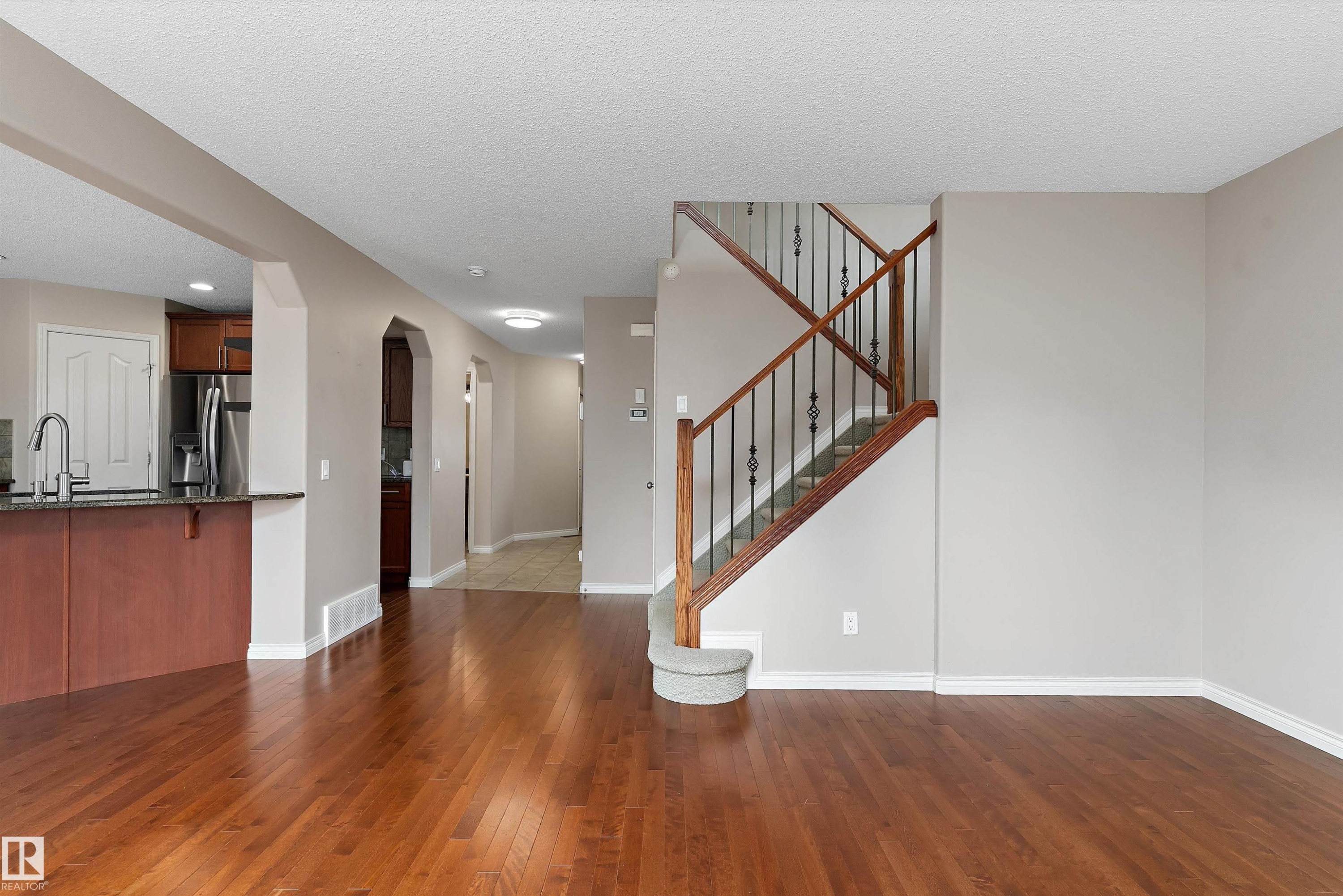 Hardwood flooring throughout the main level - 20845 92A Avenue Nw, Edmonton, AB - Indoor