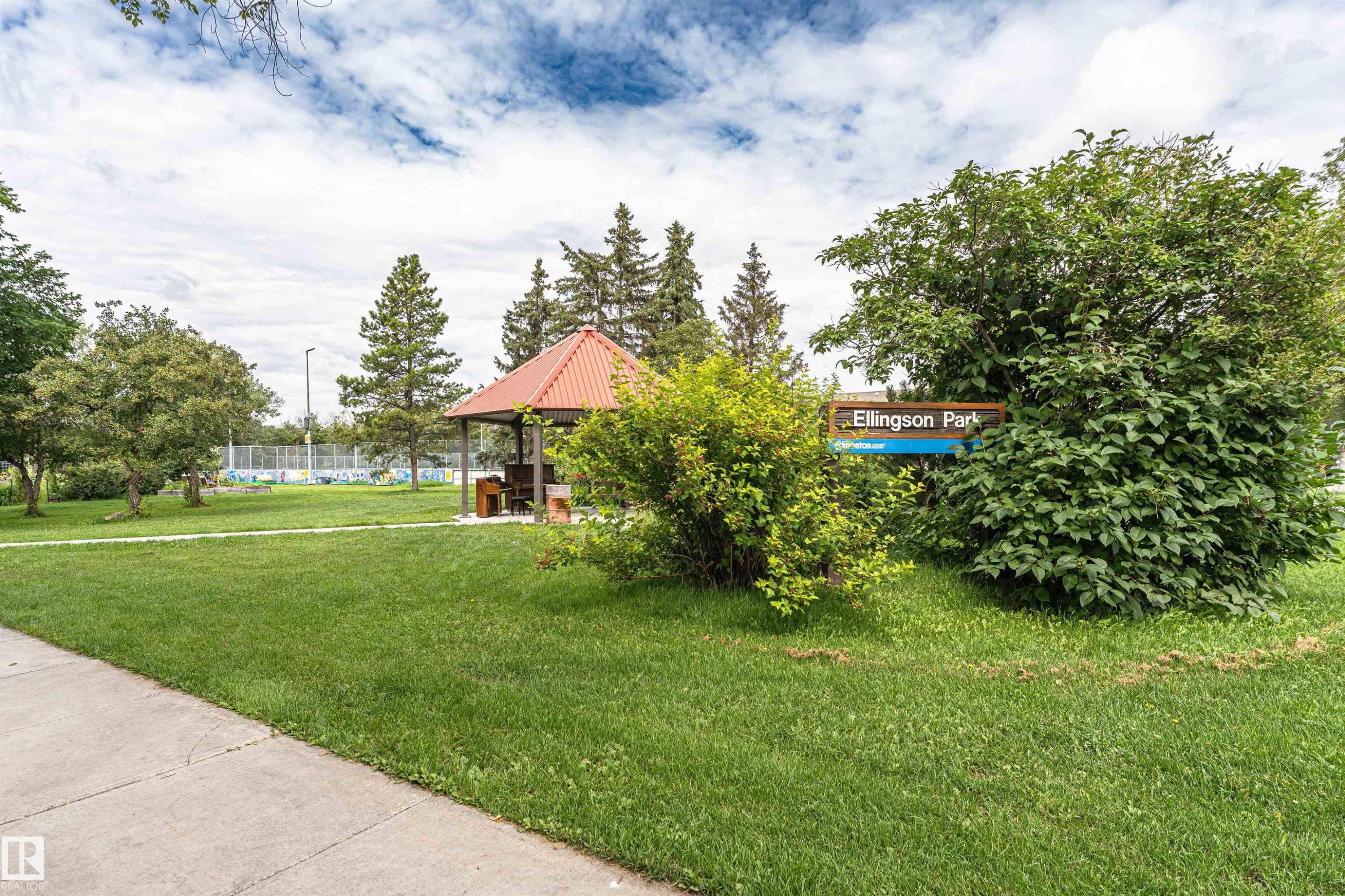 Manicured green space with concrete pathways and mature trees - 11139 62 Avenue Nw, Edmonton, AB - Outdoor