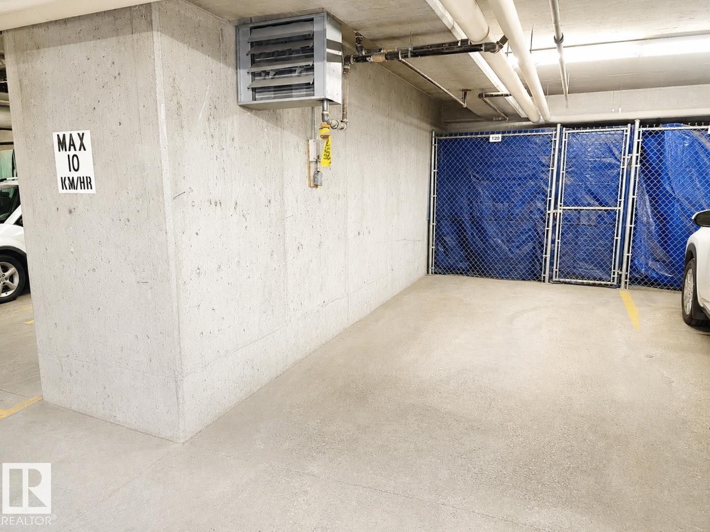 #101 911 Rabbit Hill Rd Nw, Edmonton, AB - Indoor Photo Showing Garage
