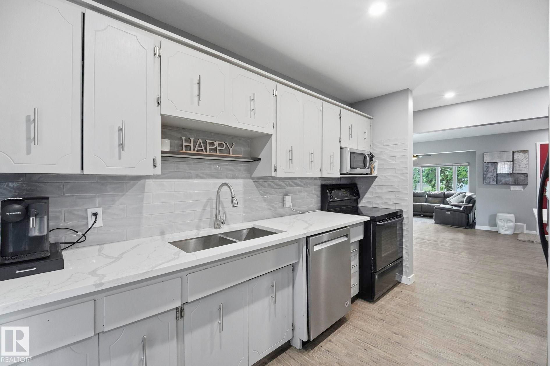 10528 45 Street Nw, Edmonton, AB - Indoor Photo Showing Kitchen With Double Sink With Upgraded Kitchen