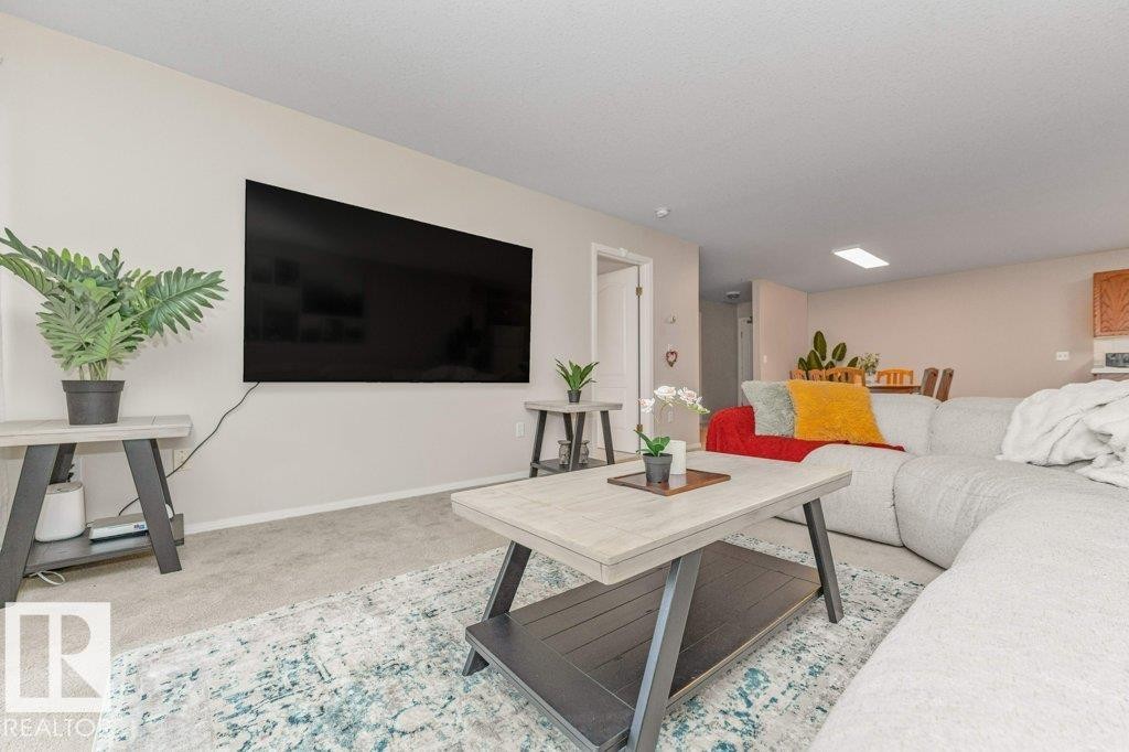#208 10421 42 Av Nw, Edmonton, AB - Indoor Photo Showing Living Room