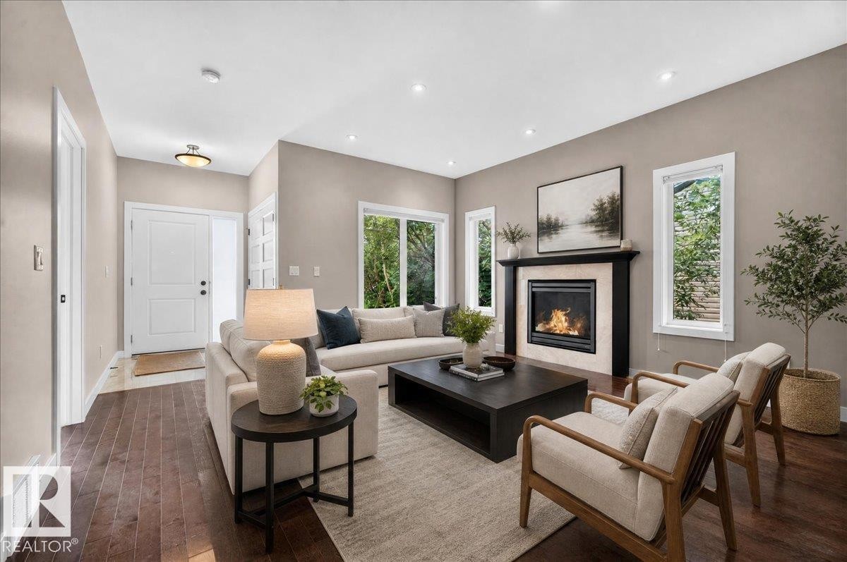 virtually staged - 12126 47 Street Nw, Edmonton, AB - Indoor Photo Showing Living Room With Fireplace