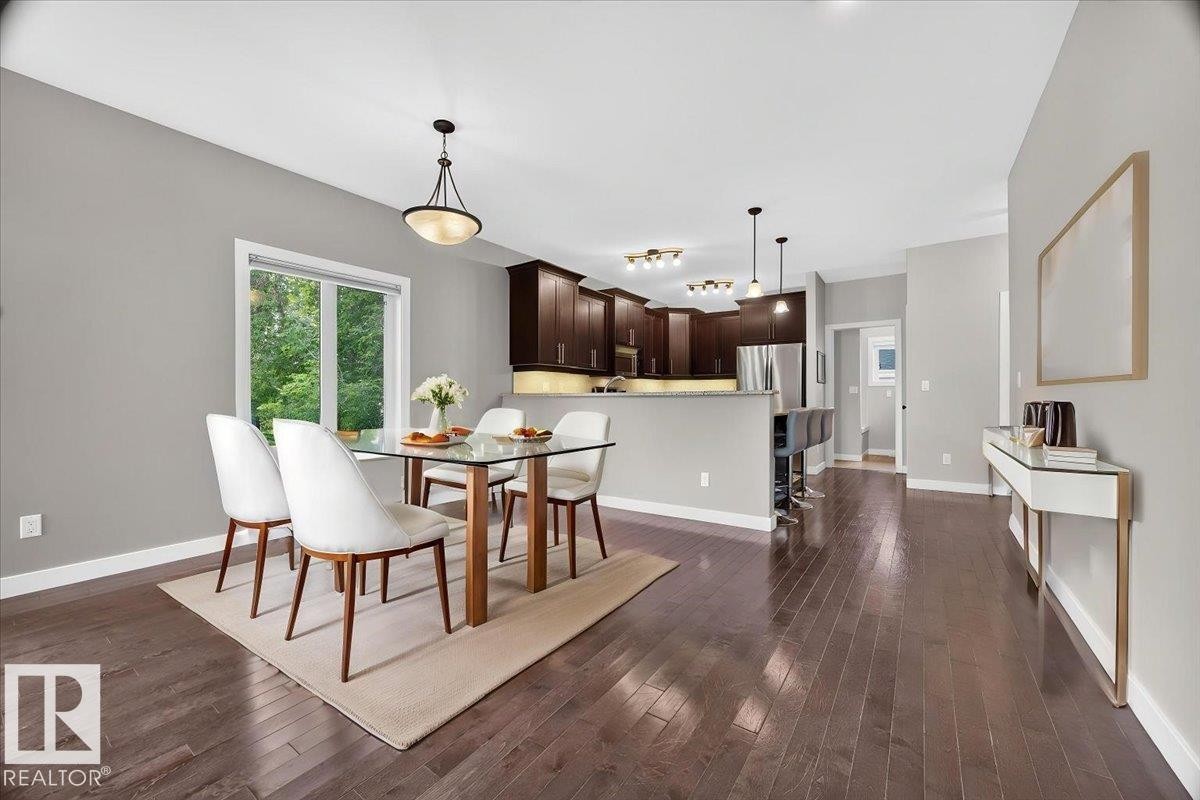 virtually staged - 12126 47 Street Nw, Edmonton, AB - Indoor Photo Showing Dining Room