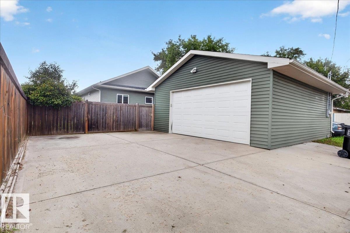 oversized double (25.6 x 23.1 ft.) with parking pad - 12126 47 Street Nw, Edmonton, AB - Outdoor With Exterior