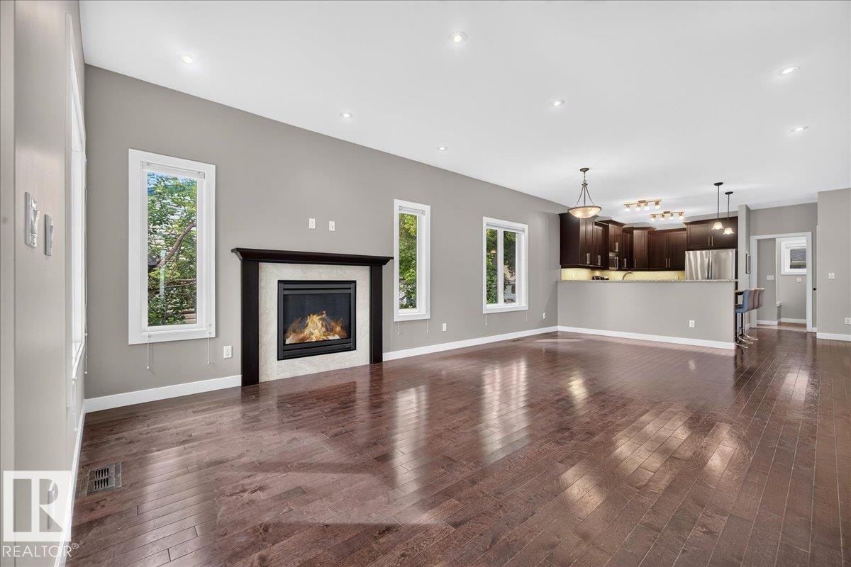 12126 47 Street Nw, Edmonton, AB - Indoor Photo Showing Living Room With Fireplace