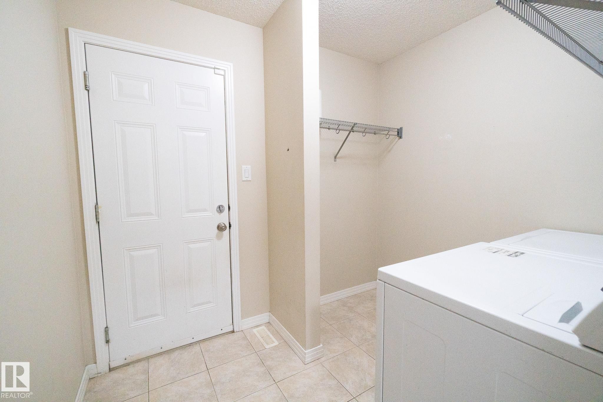 632 60 Street Sw, Edmonton, AB - Indoor Photo Showing Laundry Room