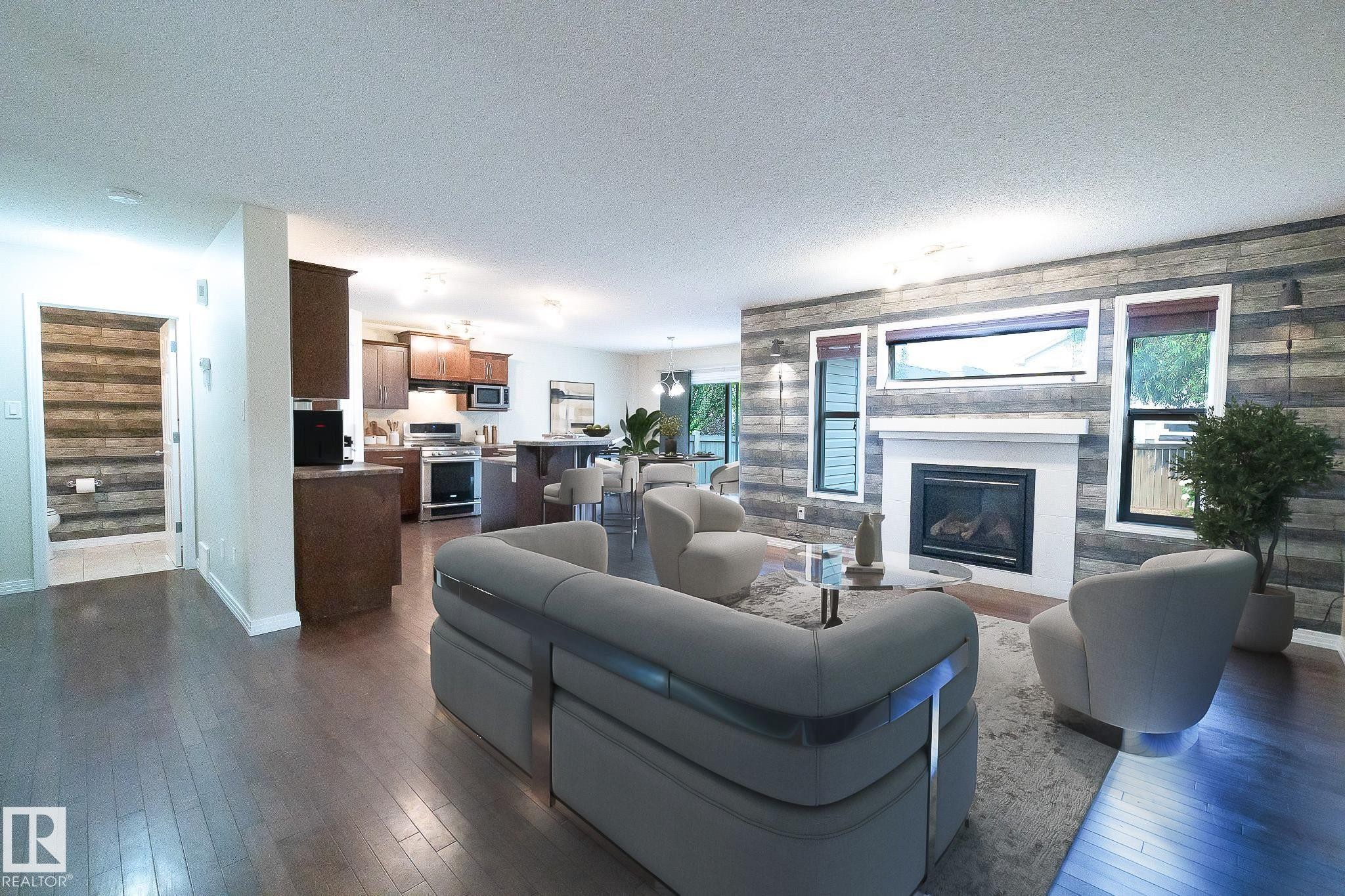 632 60 Street Sw, Edmonton, AB - Indoor Photo Showing Living Room With Fireplace