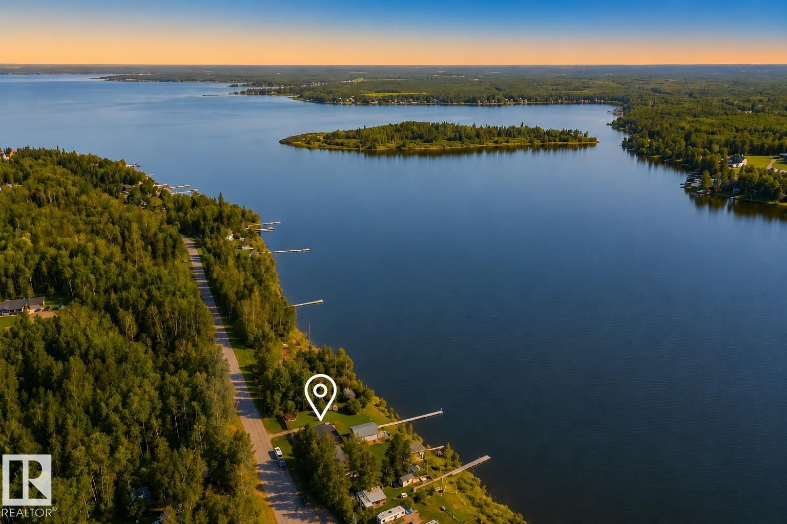Waterfront property featuring extensive shoreline access - 264 Beach Avenue, Rural Barrhead County, AB - Outdoor With Body Of Water With View