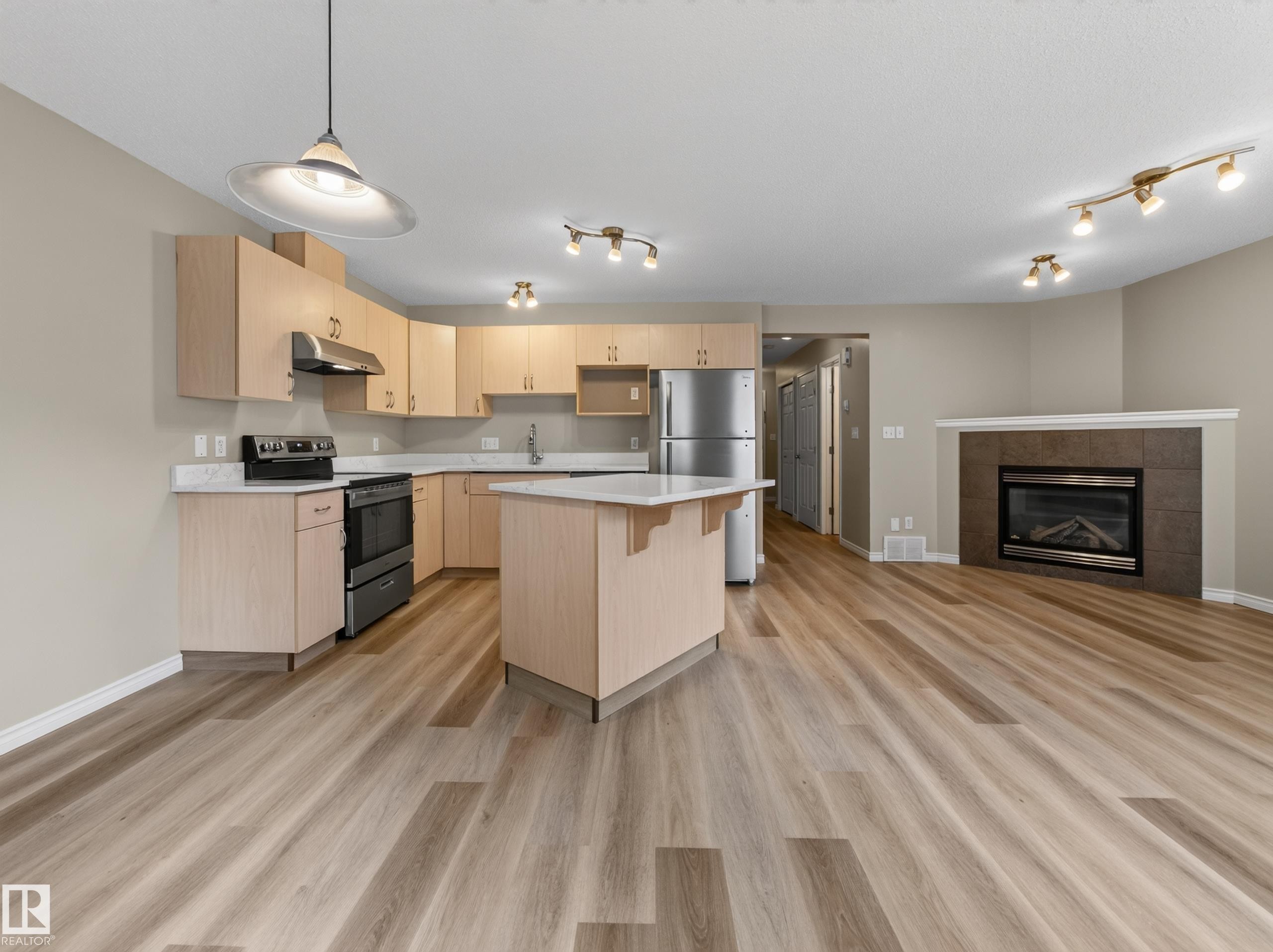 13003 101 Street Nw, Edmonton, AB - Indoor Photo Showing Kitchen With Fireplace