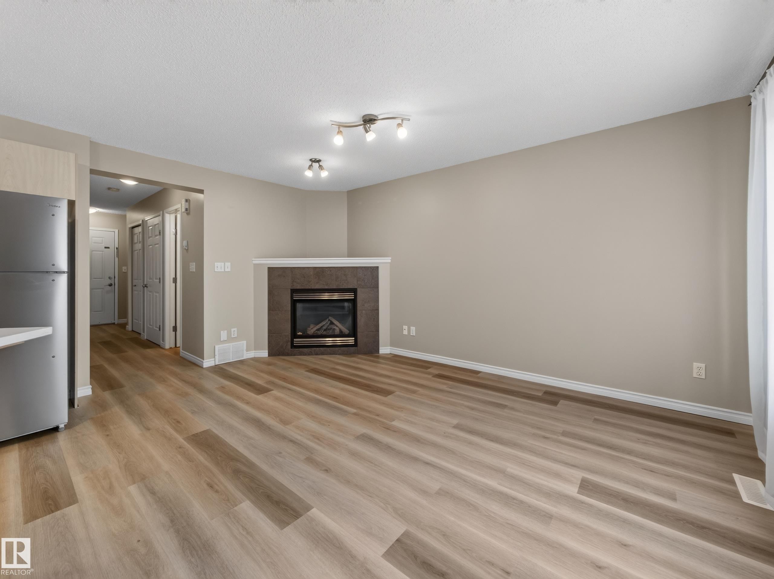 13003 101 Street Nw, Edmonton, AB - Indoor Photo Showing Living Room With Fireplace