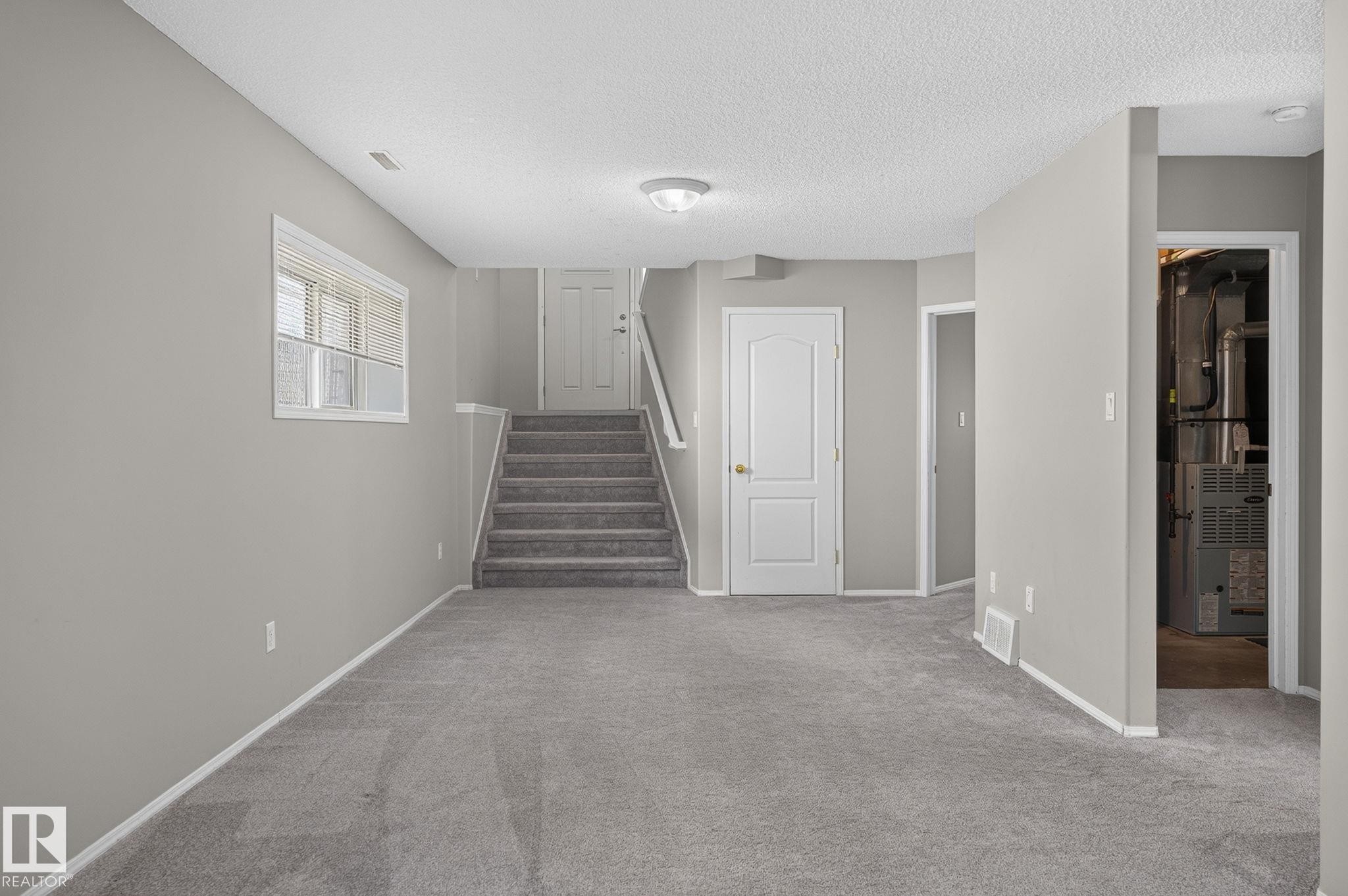 227 Wyman Lane Nw, Edmonton, AB - Indoor Photo Showing Other Room
