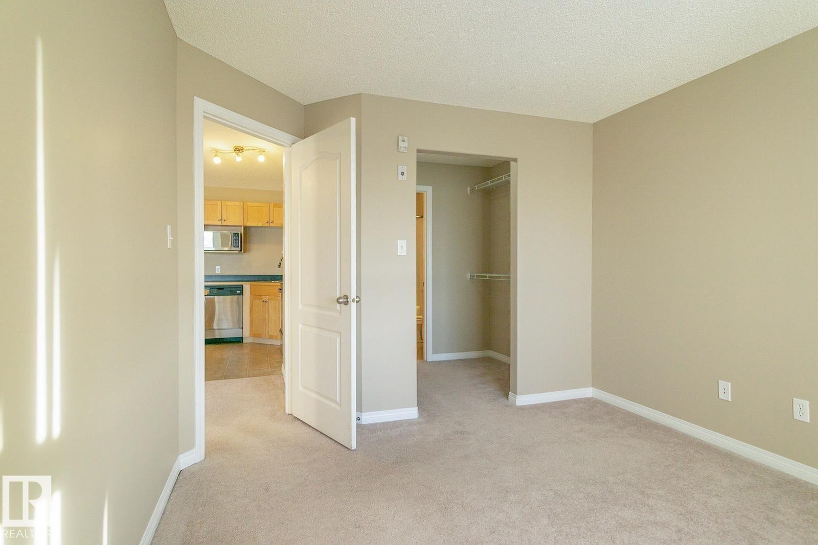 #409 5350 199 St Nw, Edmonton, AB - Indoor Photo Showing Other Room