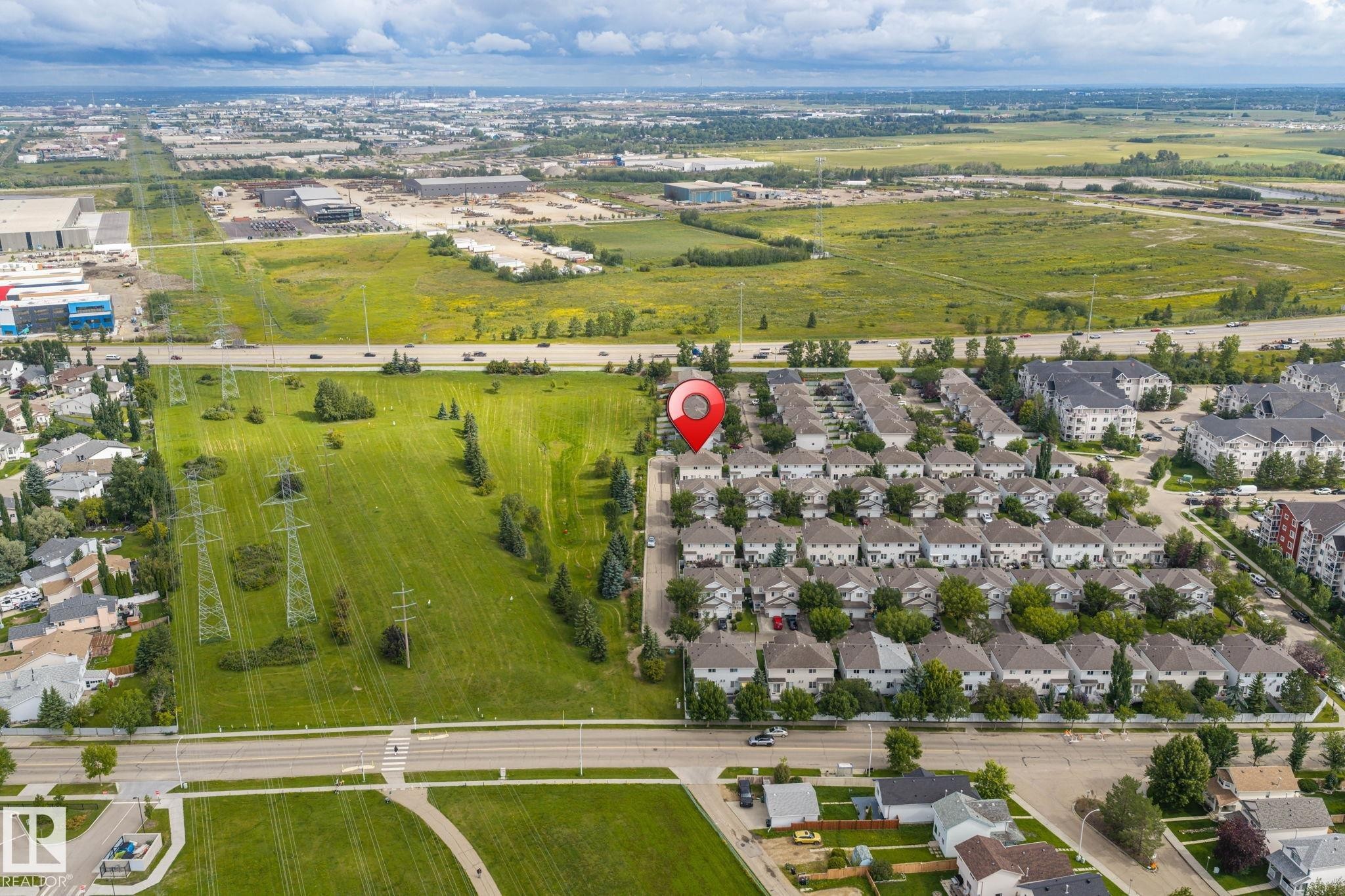 Residential development featuring multiple townhome-style residences - #80 4350 23St Nw, Edmonton, AB - Outdoor With View