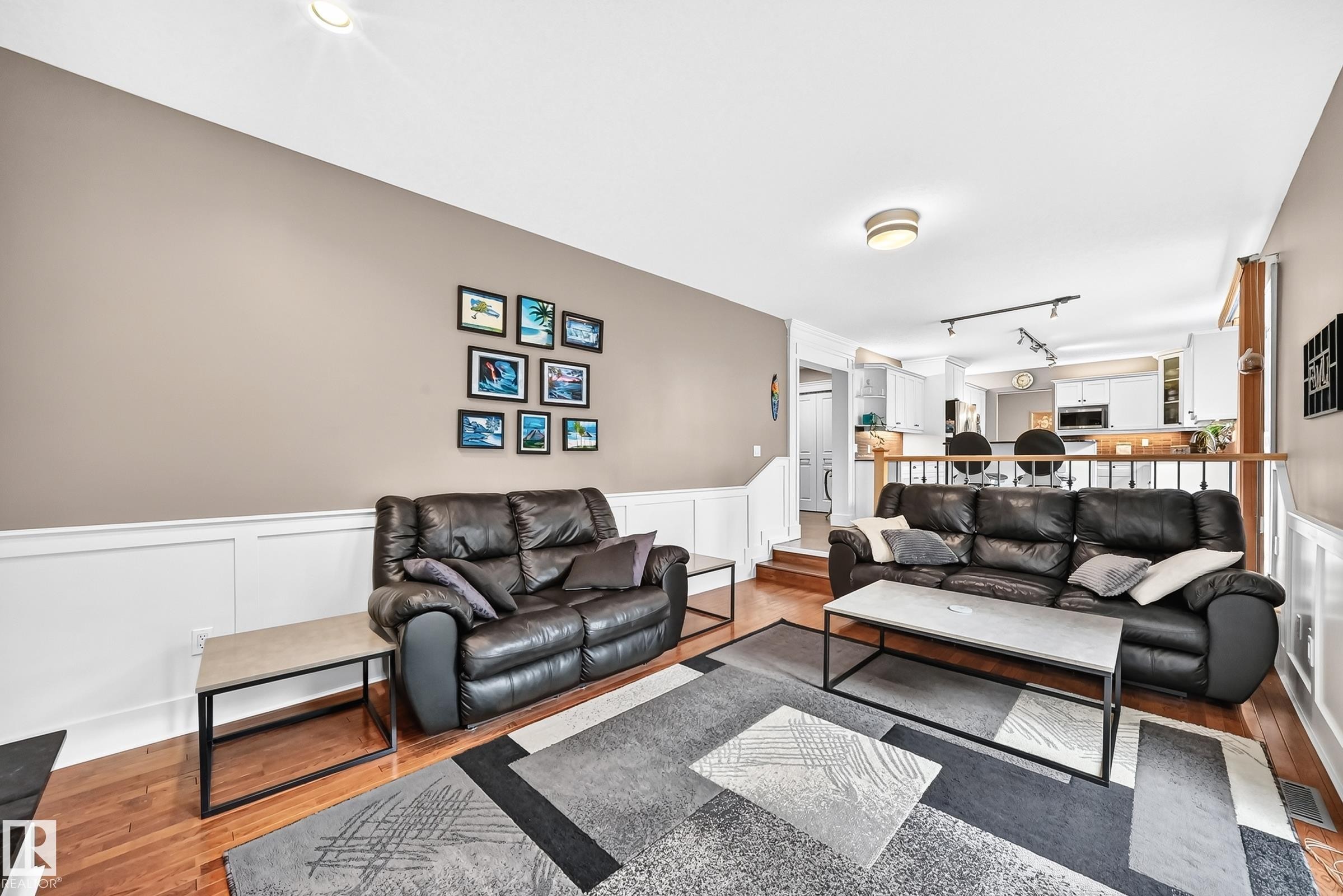 Hardwood flooring throughout the living space - #38 24512 Sturgeon Rd, Rural Sturgeon County, AB