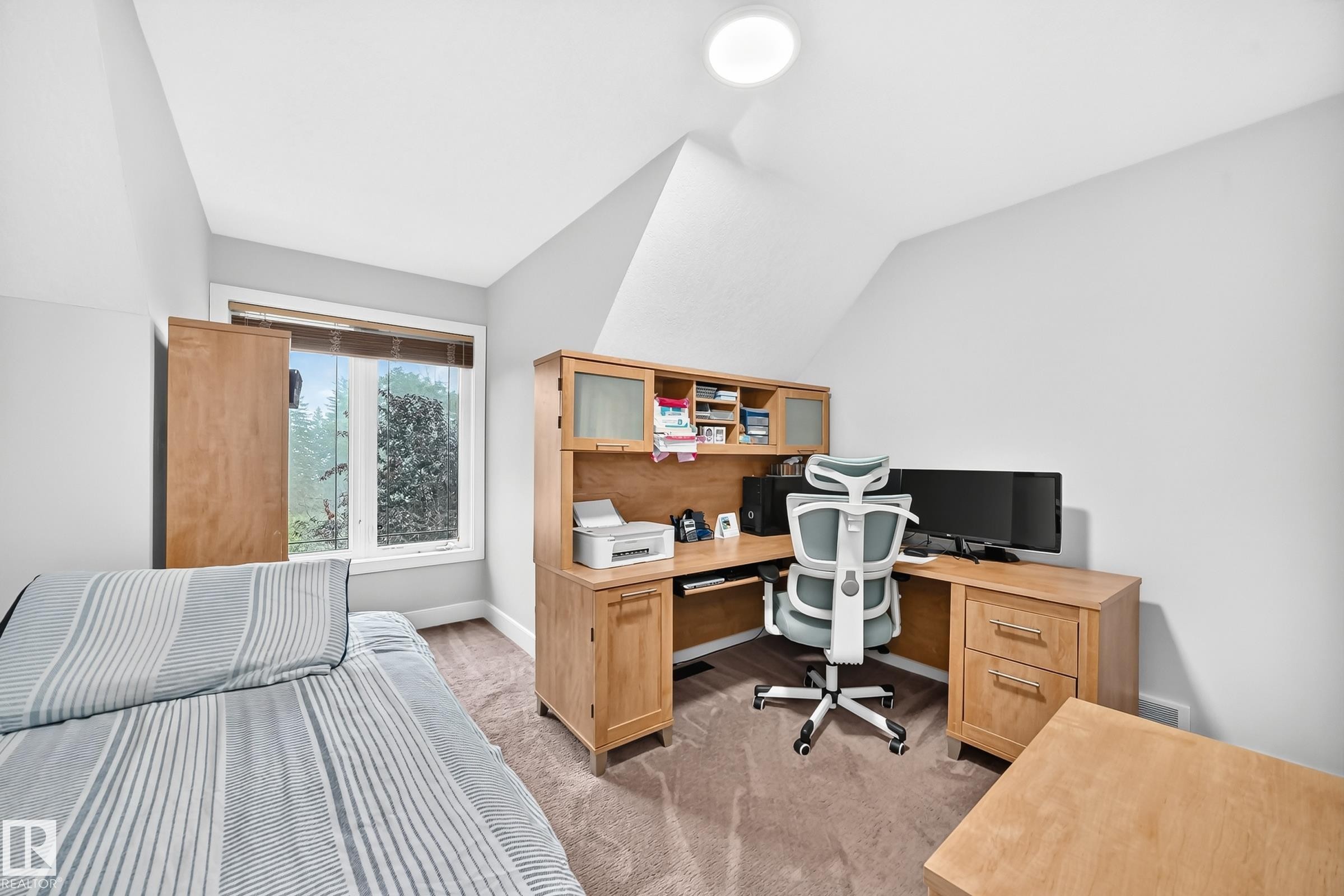 Angled ceiling lines and a recessed light fixture - #38 24512 Sturgeon Rd, Rural Sturgeon County, AB