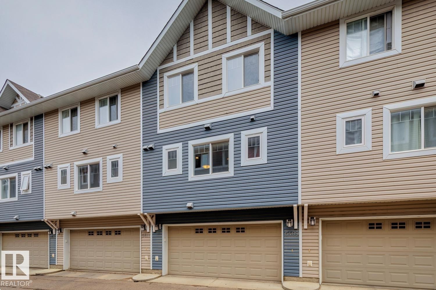 Multi-level exterior with horizontal siding and prominent gables - 5409 3 Avenue Sw, Edmonton, AB - Outdoor