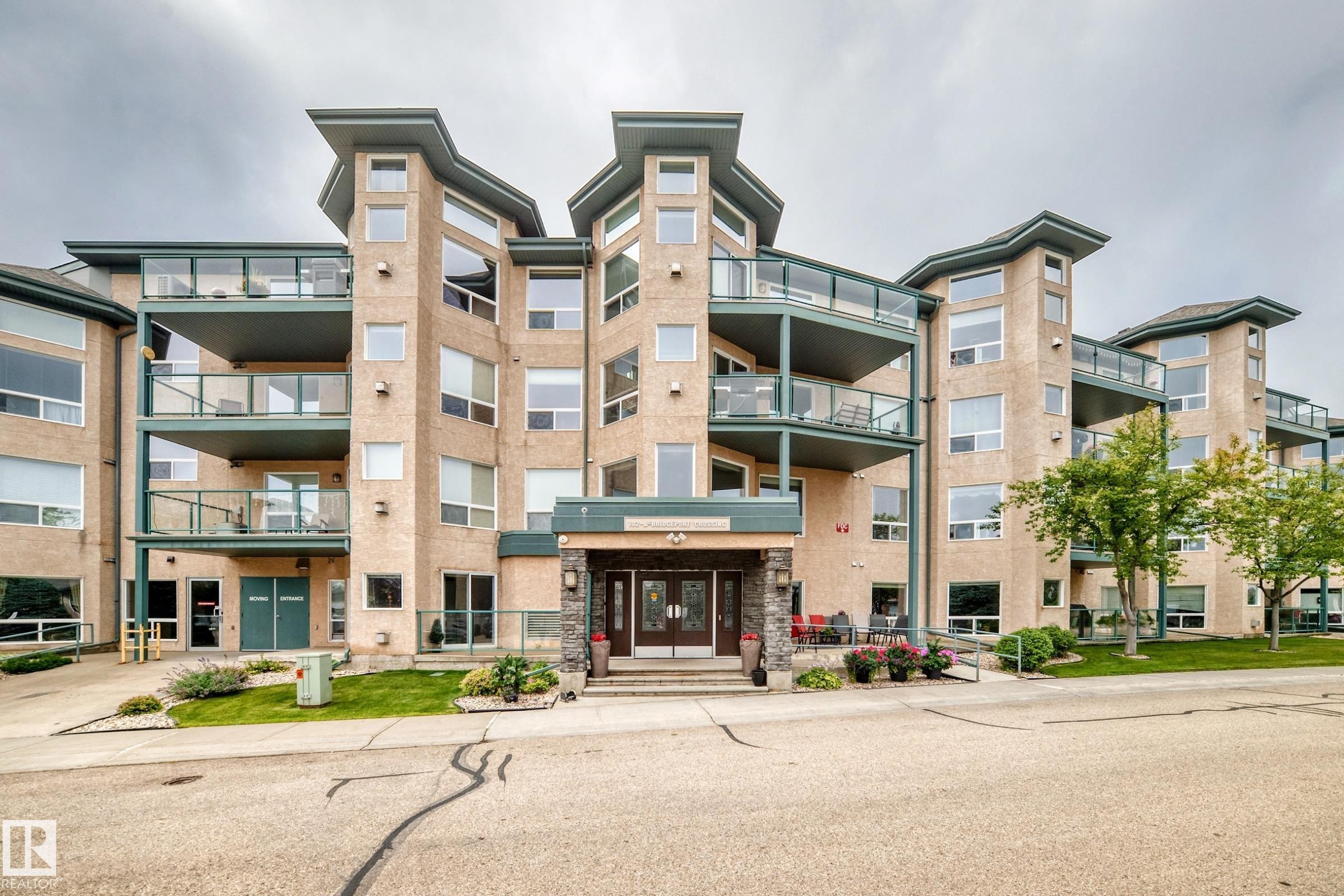 #209 102 Bridgeport Cx, Leduc, AB - Outdoor With Balcony With Facade