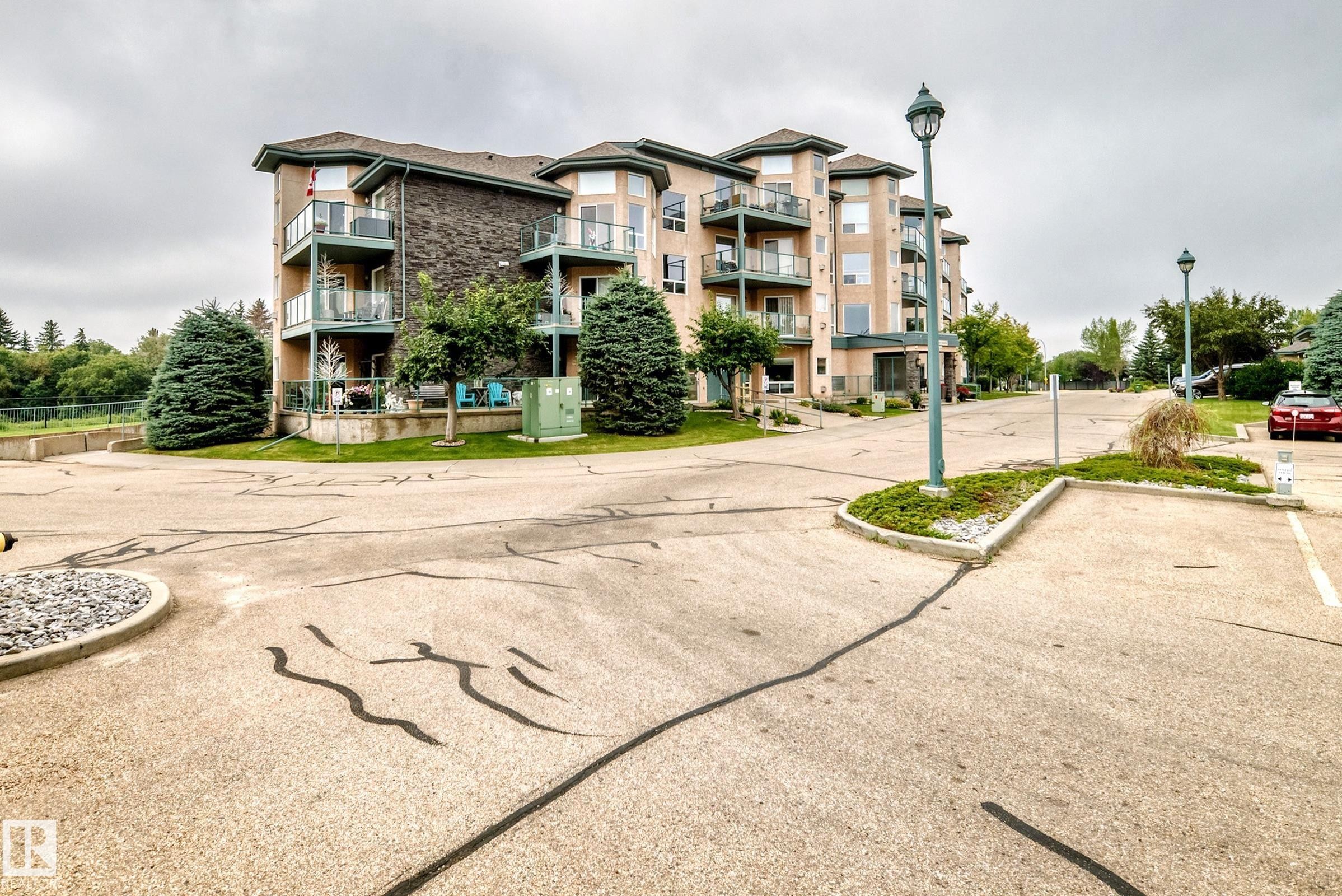 #209 102 Bridgeport Cx, Leduc, AB - Outdoor With Balcony With Facade