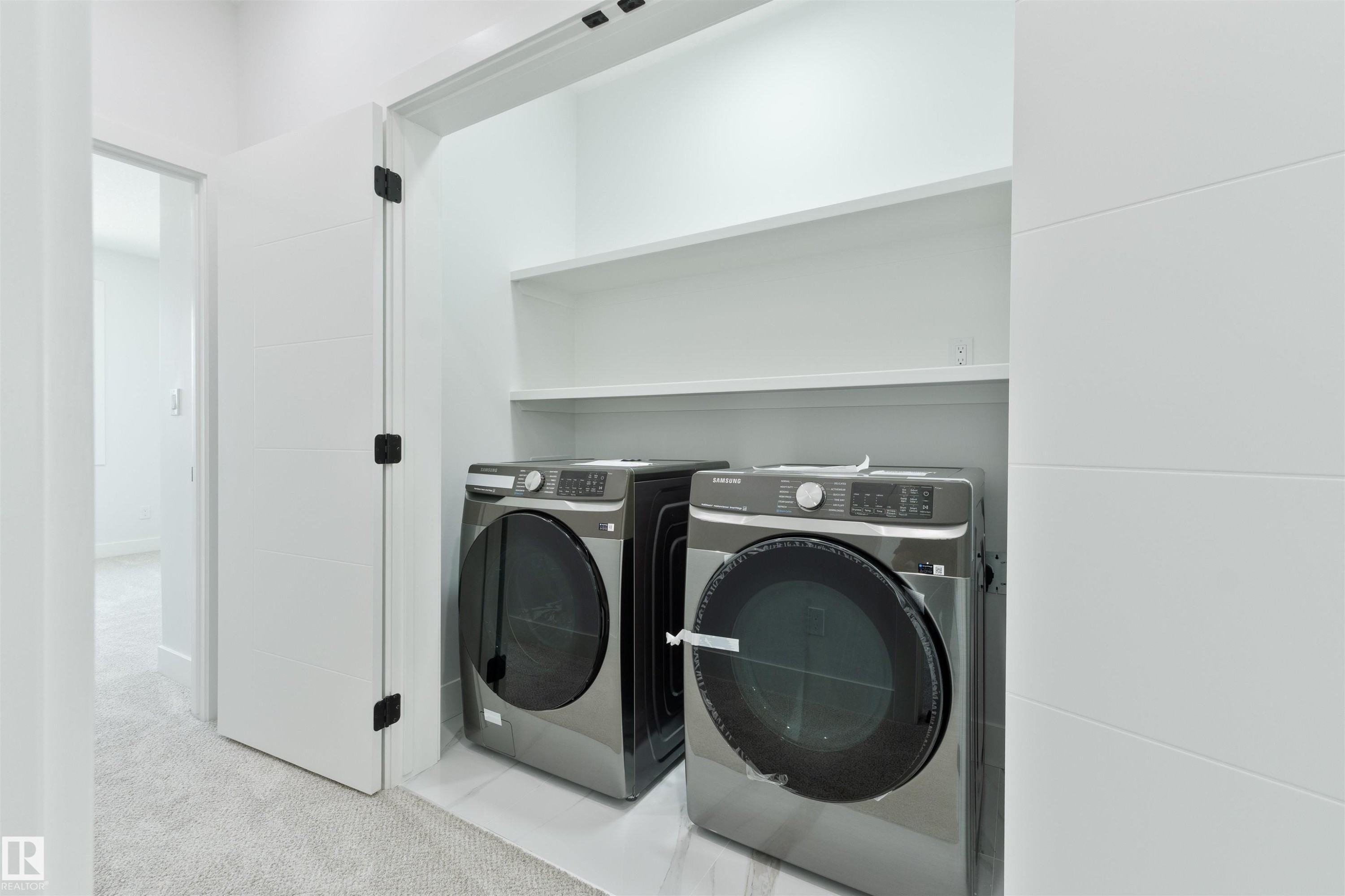 573 Ashgrove Circle, Leduc, AB - Indoor Photo Showing Laundry Room