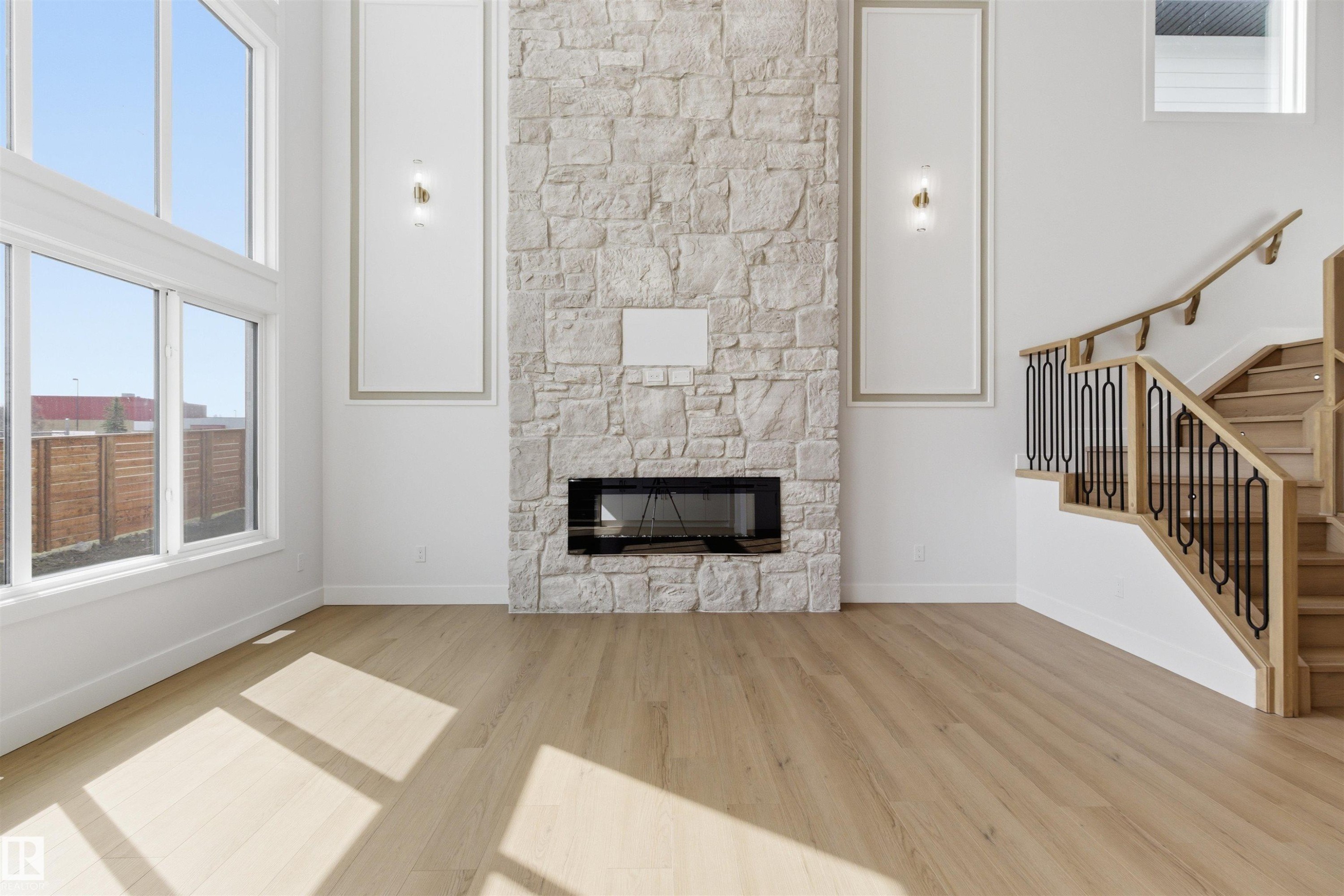 529 Ashgrove Circle, Leduc, AB - Indoor Photo Showing Living Room With Fireplace