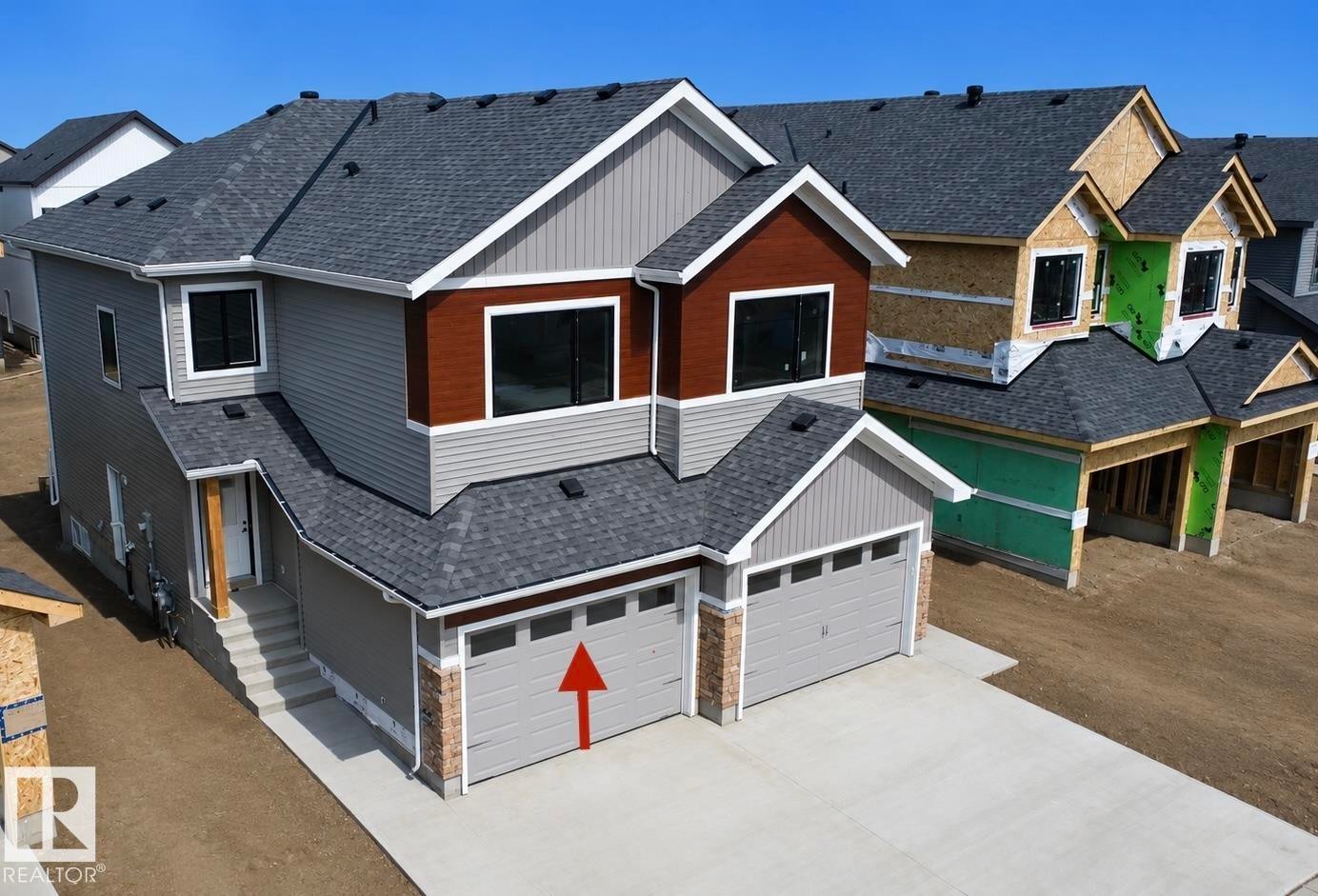 Two-story residence featuring a gray and brown exterior - 13118 186 Avenue Nw, Edmonton, AB - Outdoor