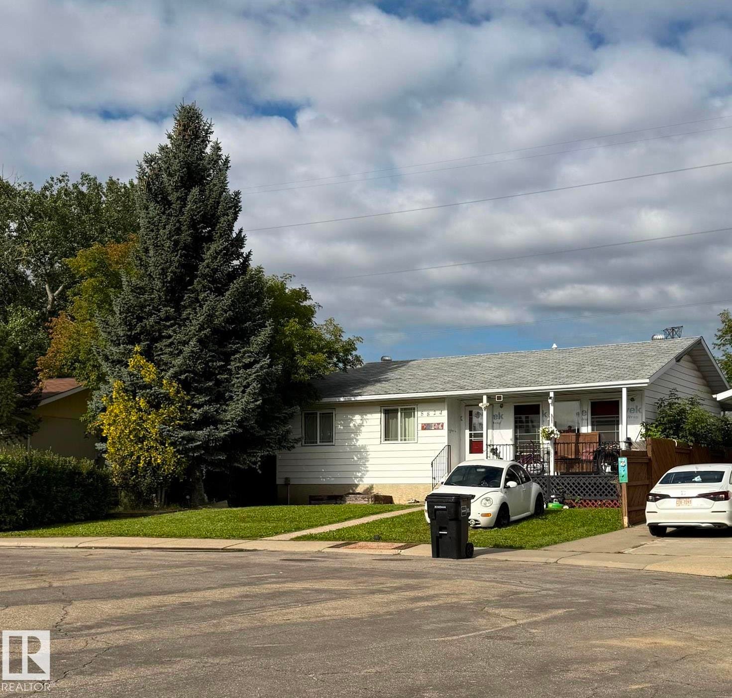 Single-story residence featuring white siding and a covered front porch - 8824 30 Avenue Nw, Edmonton, AB - Outdoor