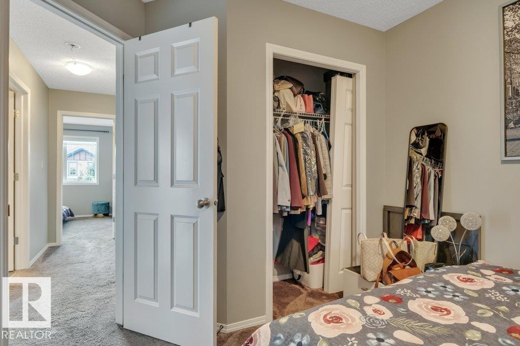 723 Secord Boulevard Nw, Edmonton, AB - Indoor Photo Showing Bedroom