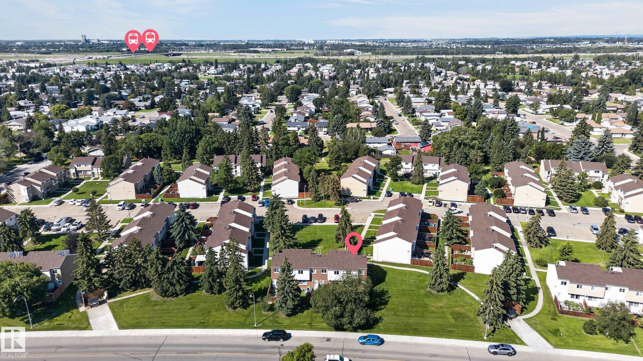 Expansive neighborhood with numerous residential buildings, mature trees, and paved roads - 18247 93 Avenue Nw, Edmonton, AB - Outdoor With View