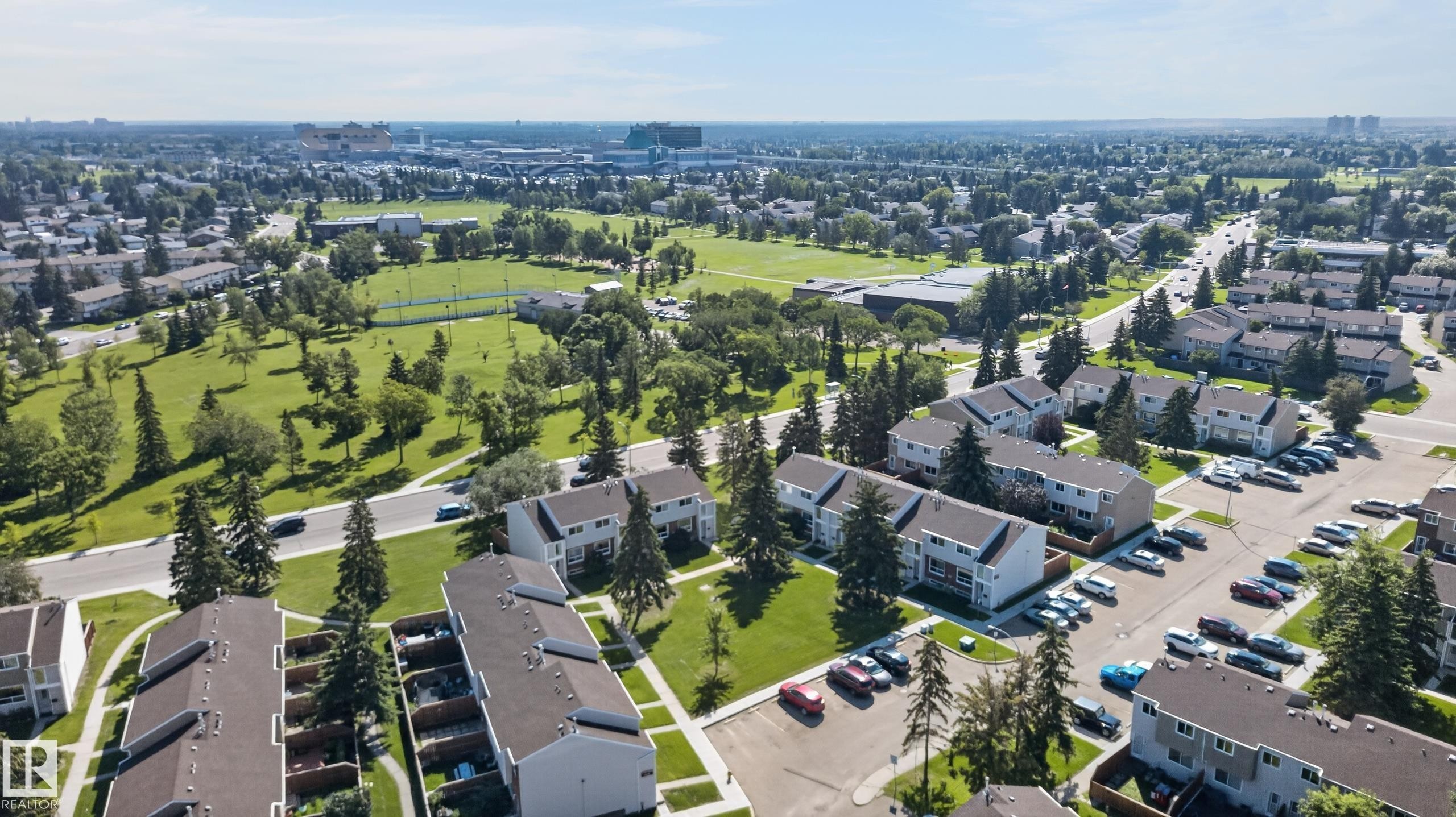 Residential community featuring townhomes and surface parking - 18247 93 Avenue Nw, Edmonton, AB - Outdoor With View