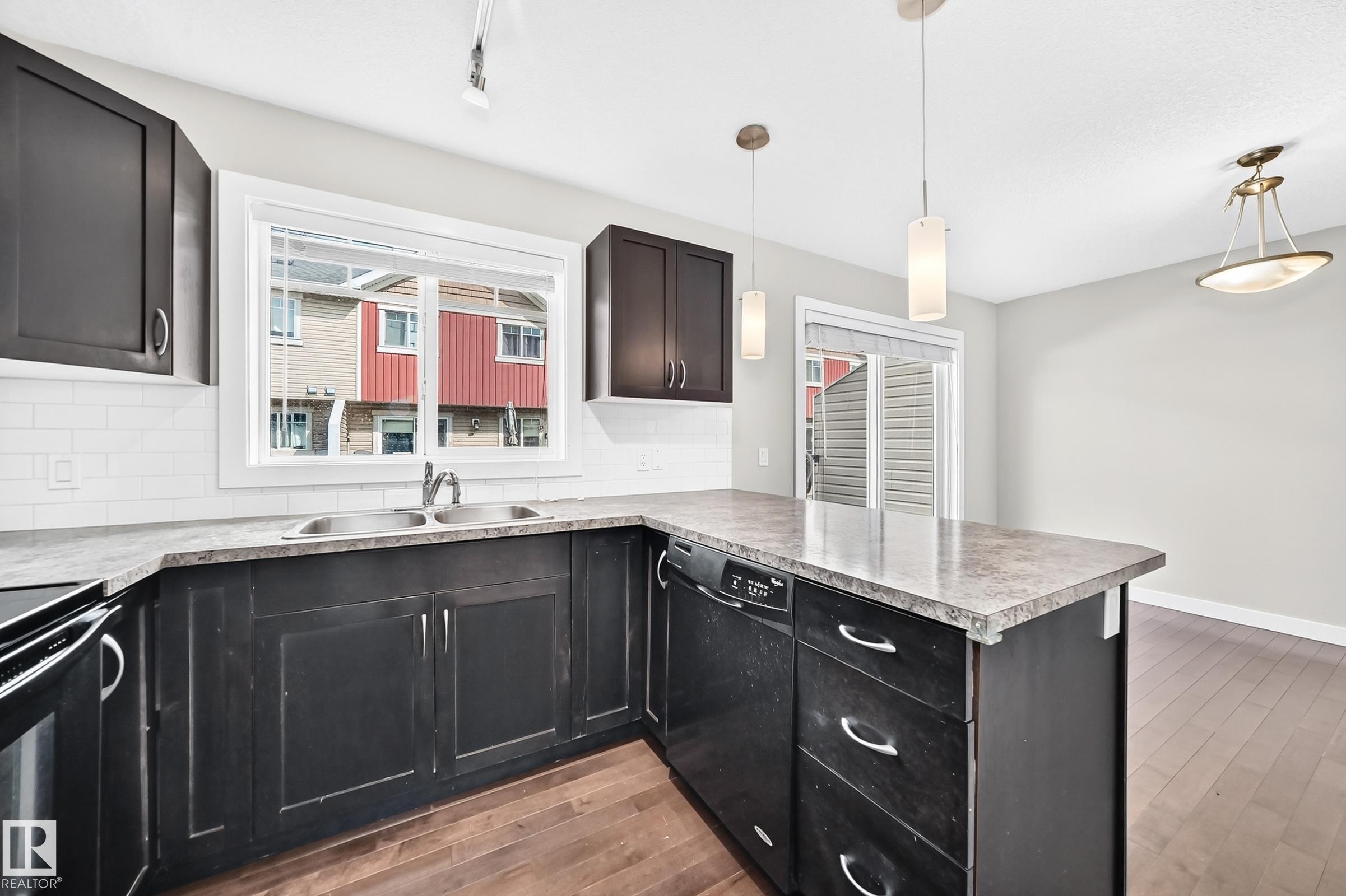 #73 9535 217 St Nw, Edmonton, AB - Indoor Photo Showing Kitchen With Double Sink